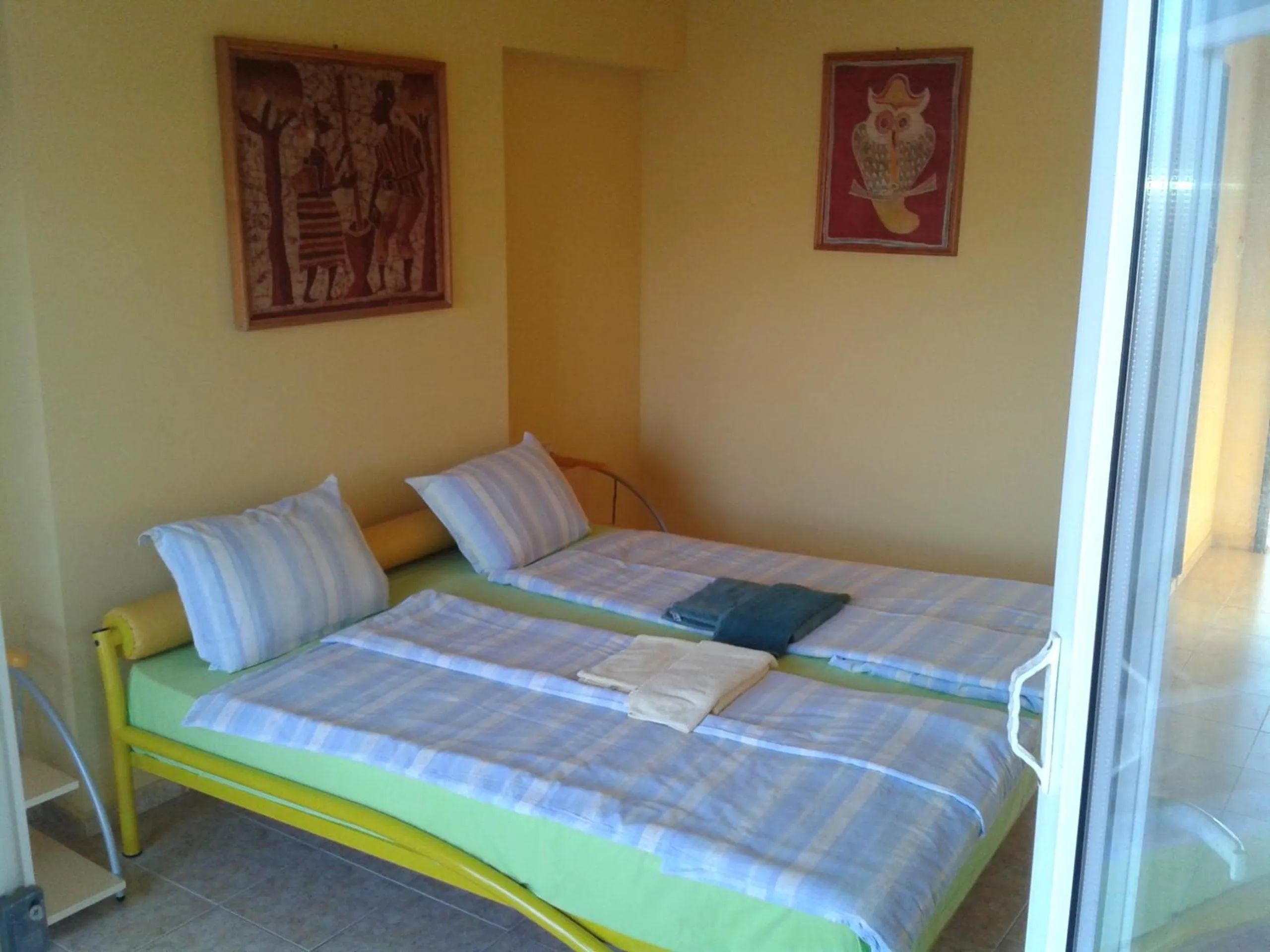 Bed in The Colourful Mansion Hotel