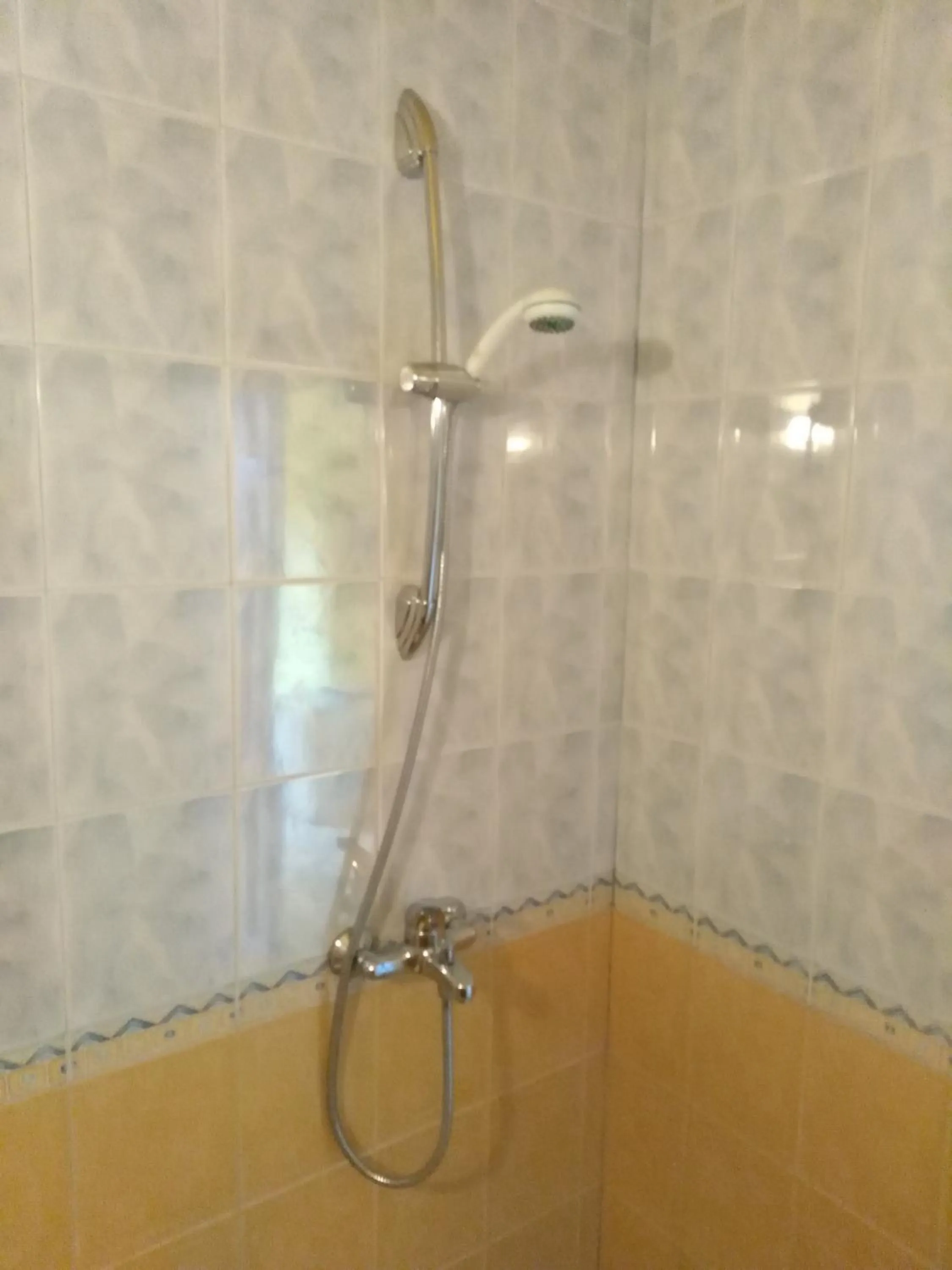 Shower in The Colourful Mansion Hotel