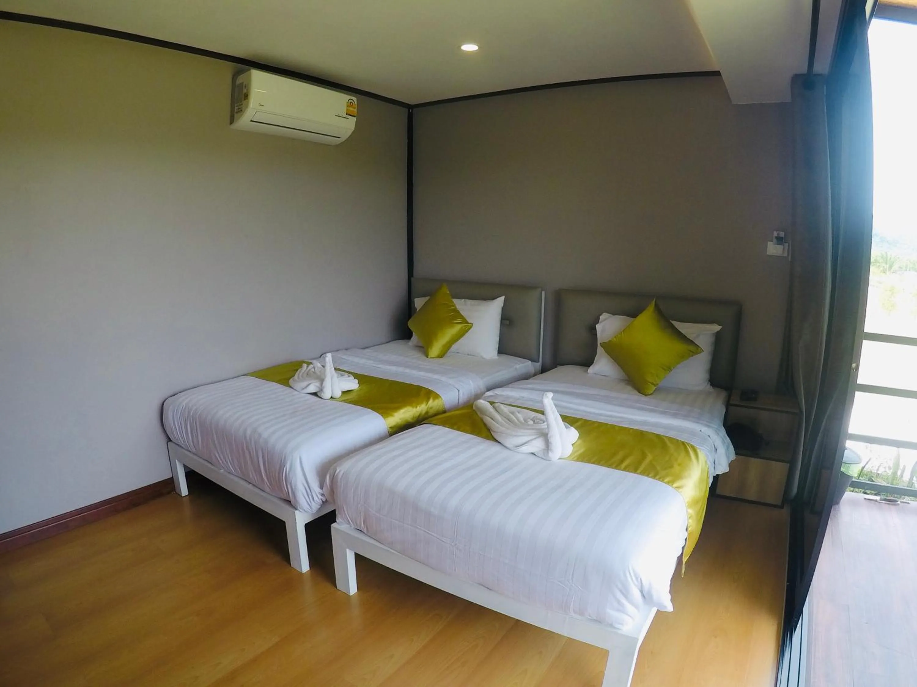 Bed in Marigold Aonang Resort