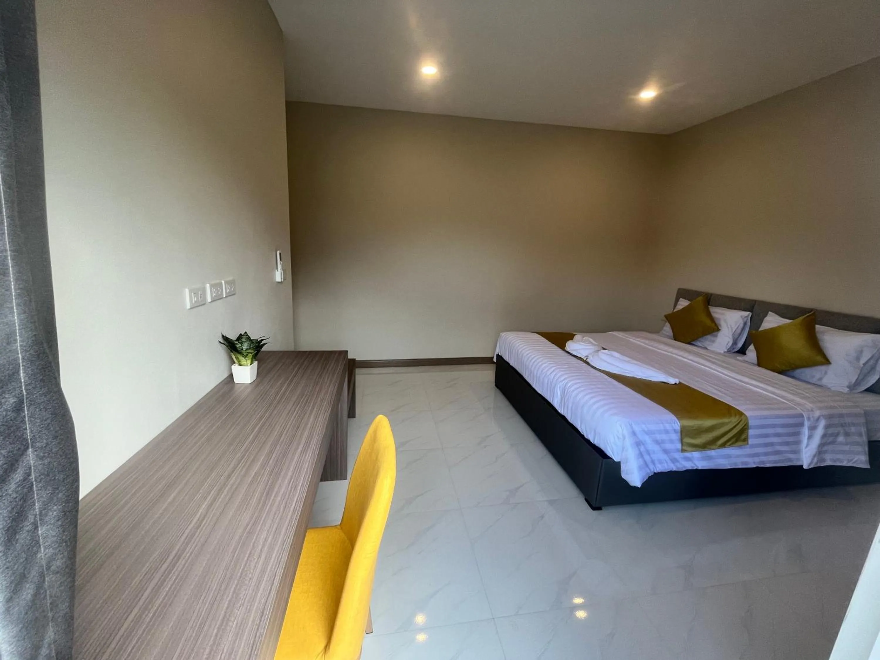 Photo of the whole room, Bed in Marigold Aonang Resort