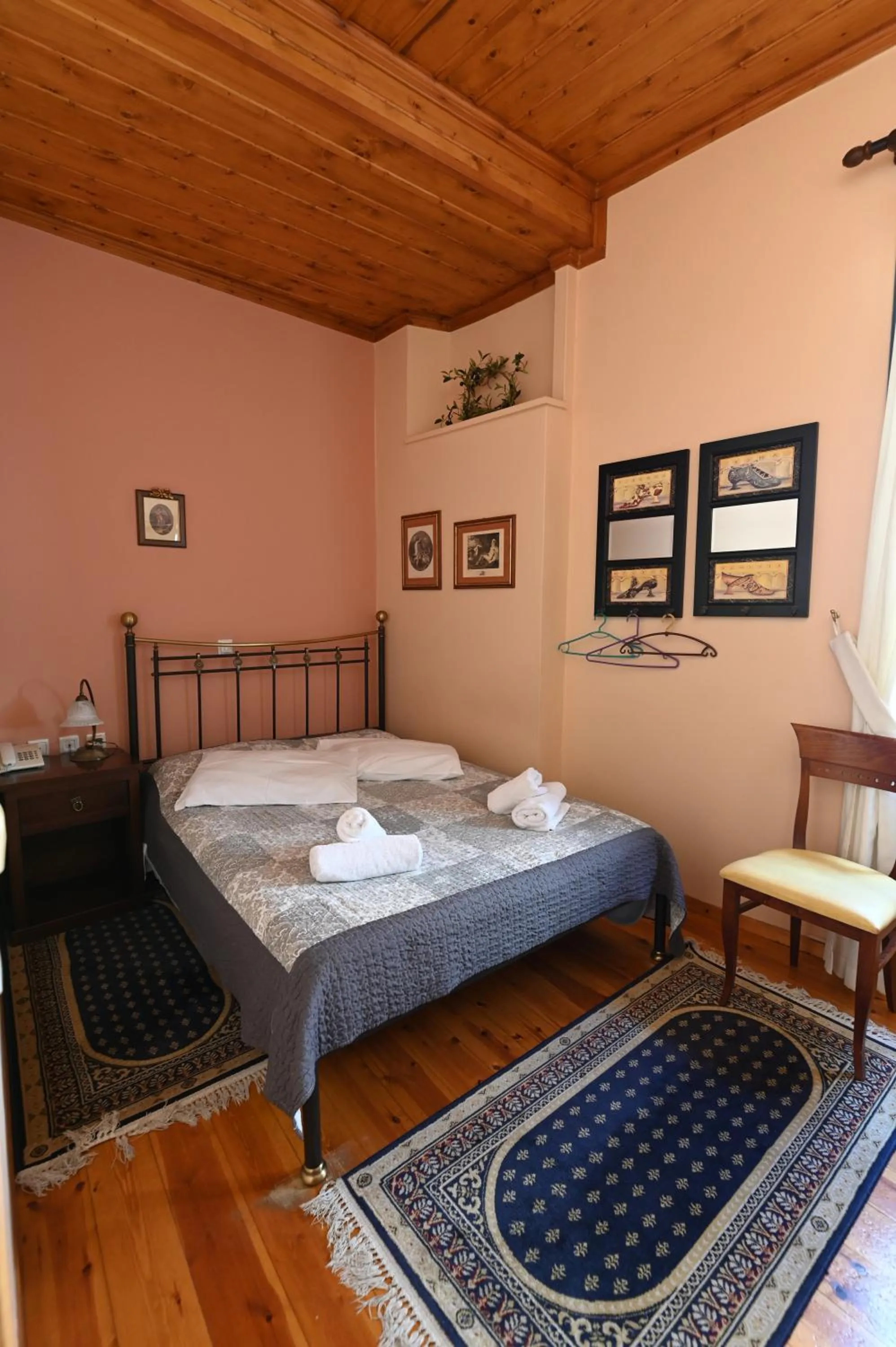 Bed in Polyxenia Hotel