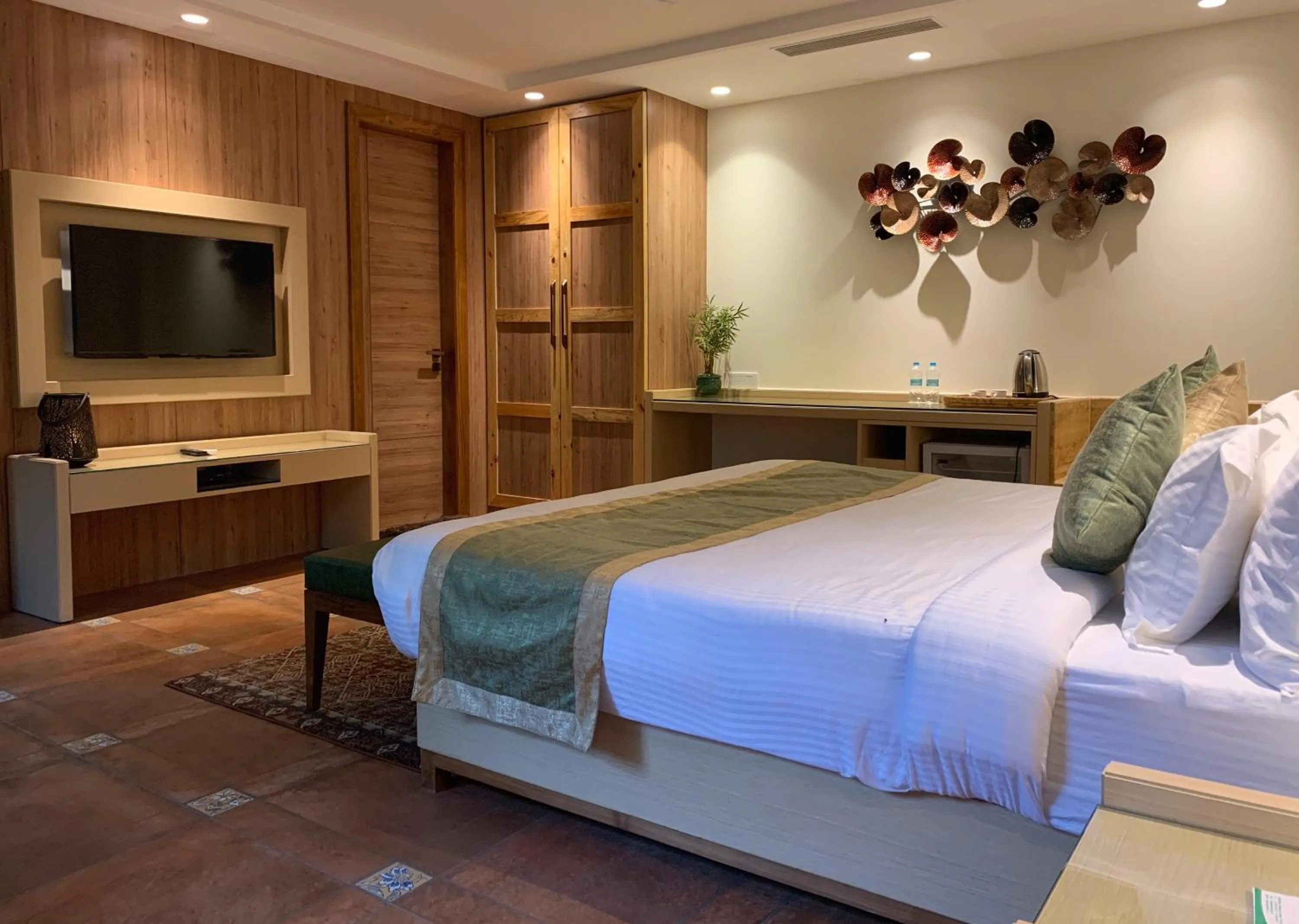 Bed in The Greenwood Resort, Guwahati