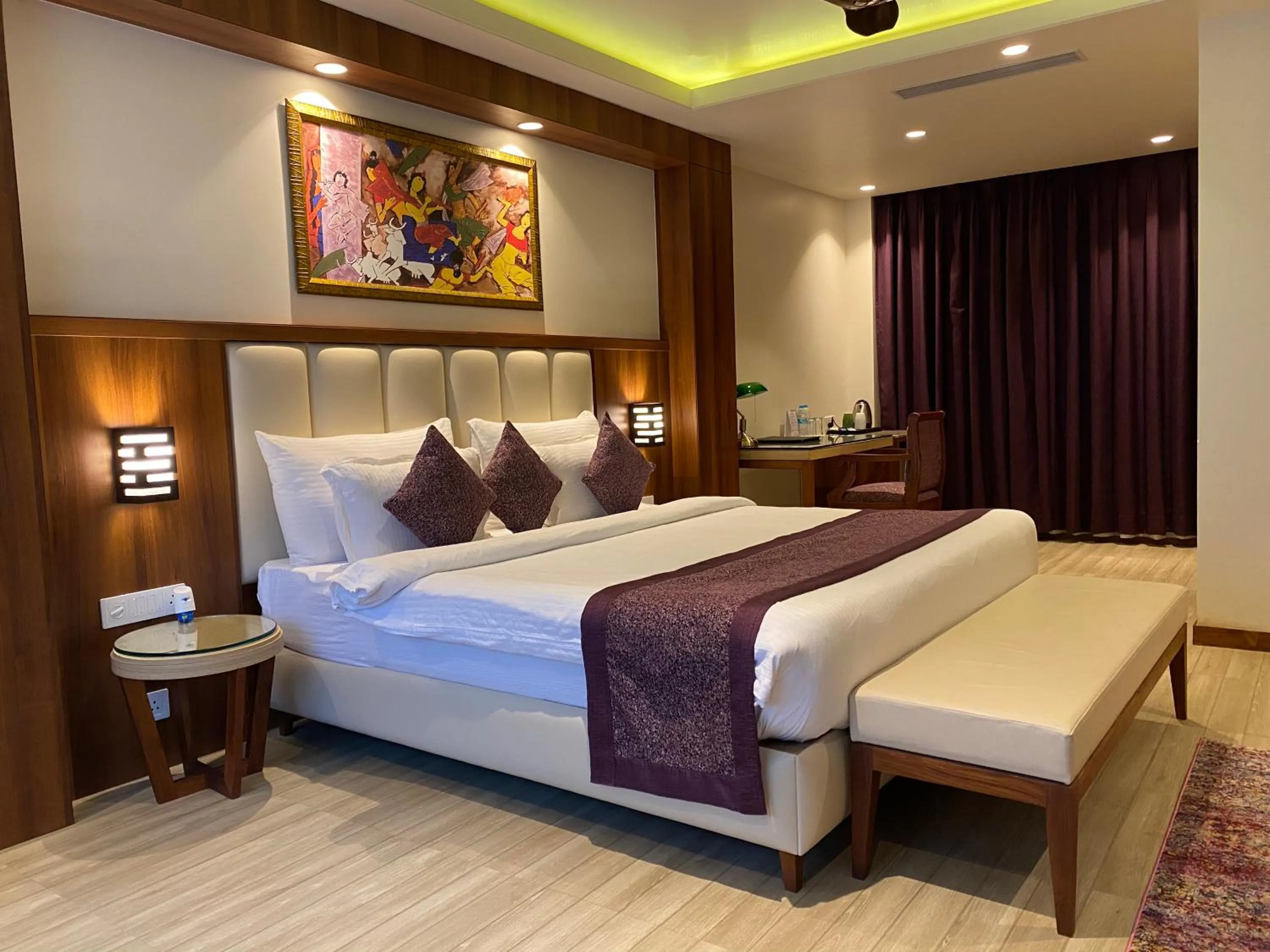 Bed in The Greenwood Resort, Guwahati