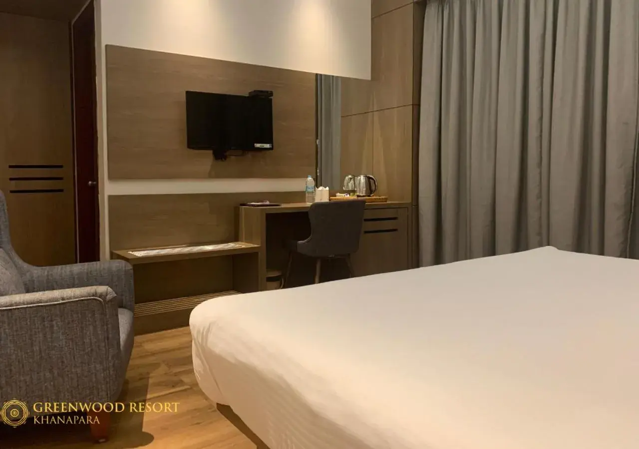 TV and multimedia, Bed in The Greenwood Resort, Guwahati TV and multimedia, Bed in The Greenwood Resort, Guwahati