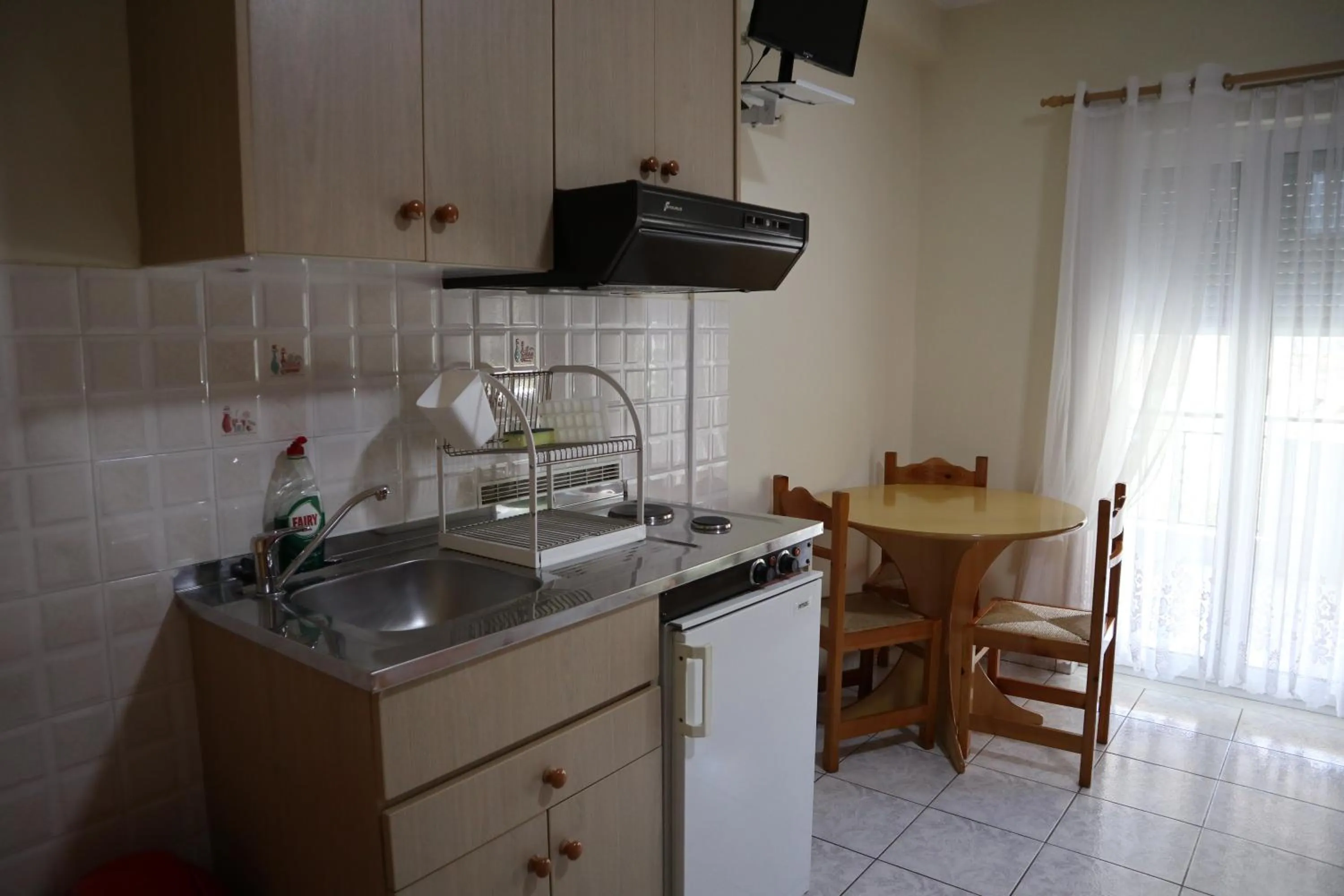 Kitchen or kitchenette in Delphin Rooms Sivota