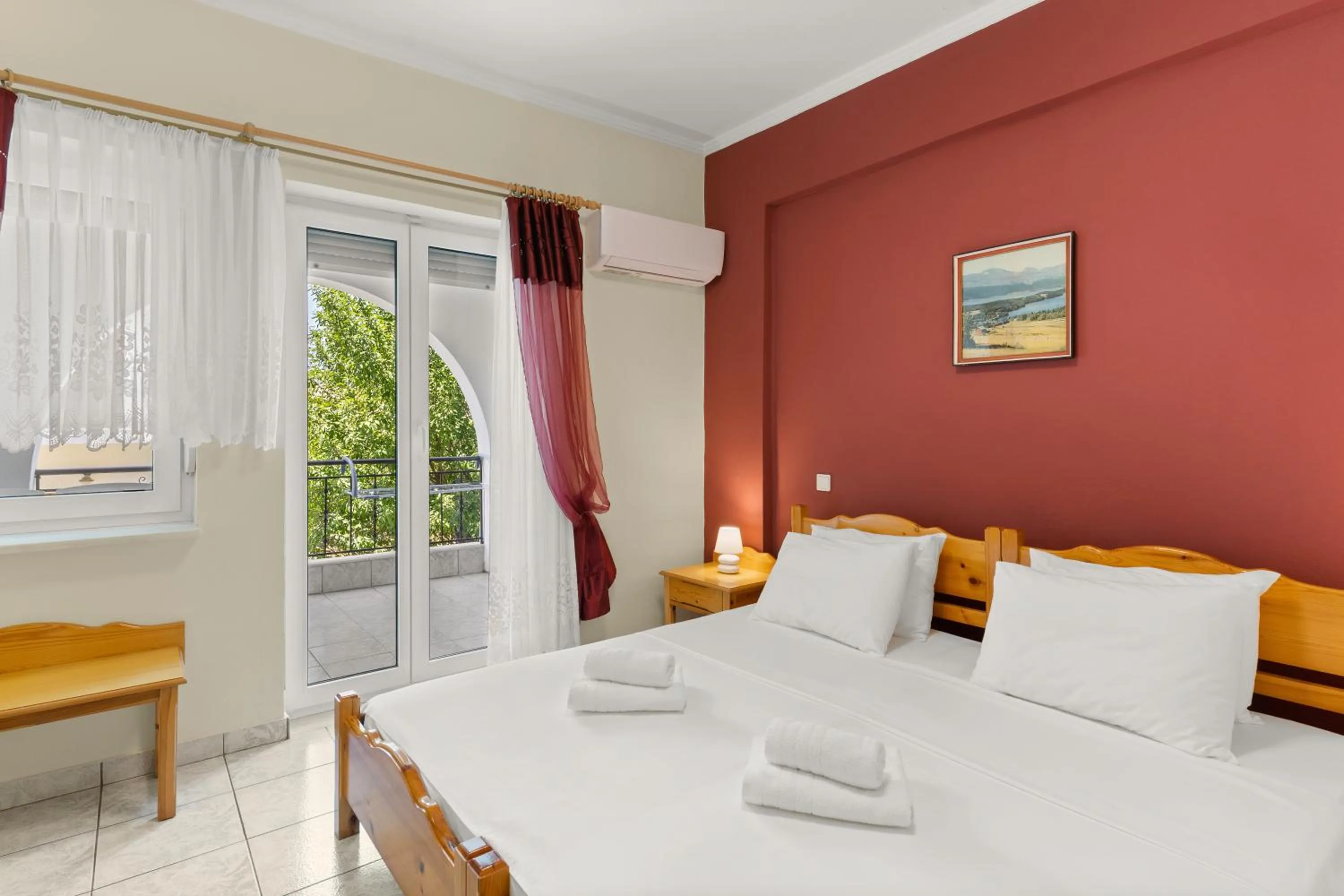 Bed in Delphin Rooms Sivota