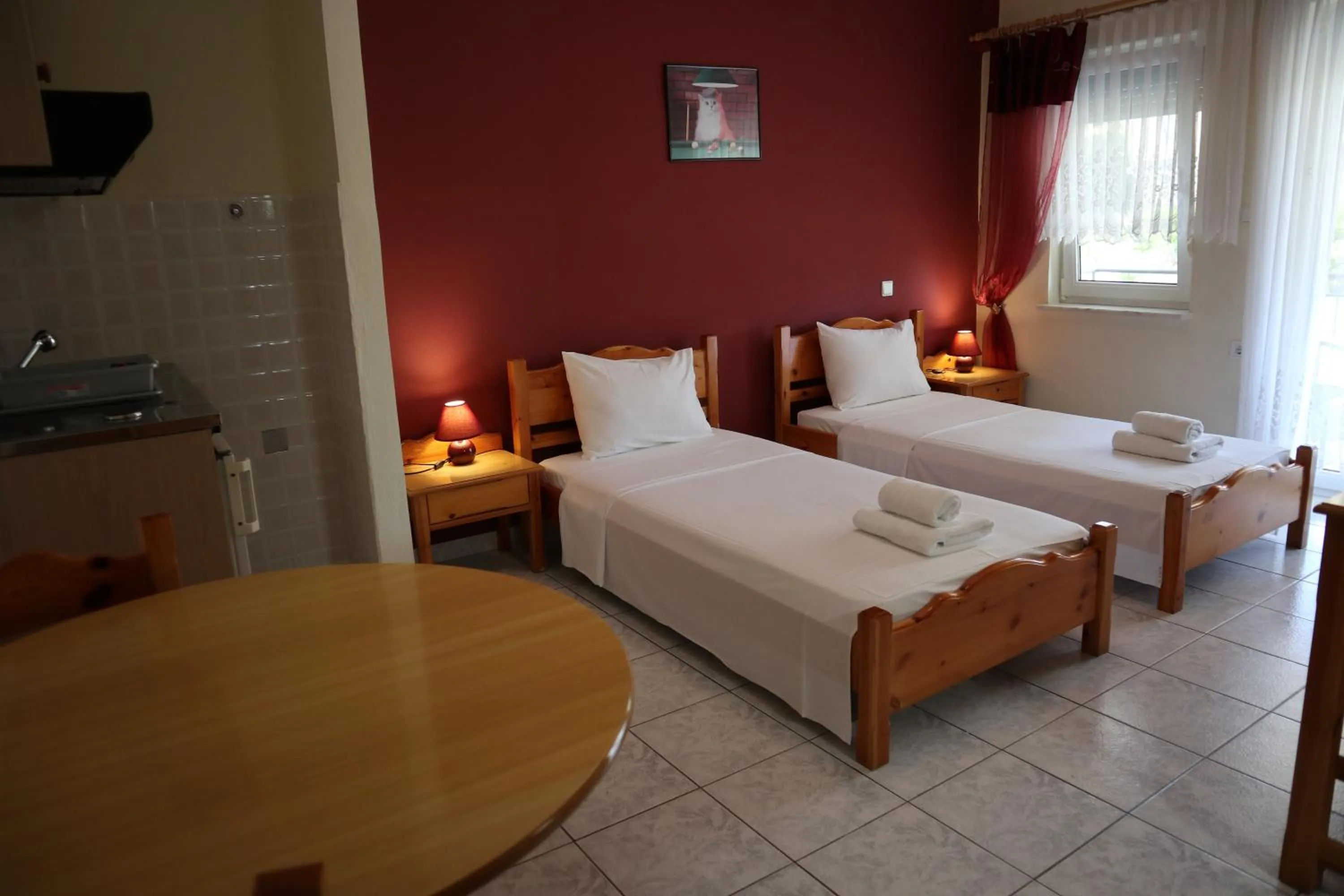 Bed in Delphin Rooms Sivota