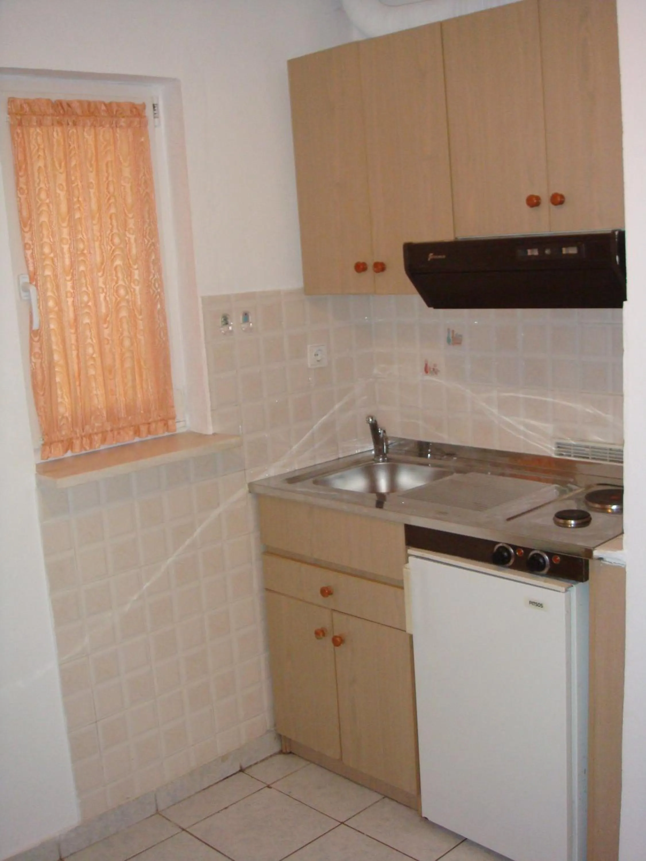 Kitchen or kitchenette in Delphin Rooms Sivota