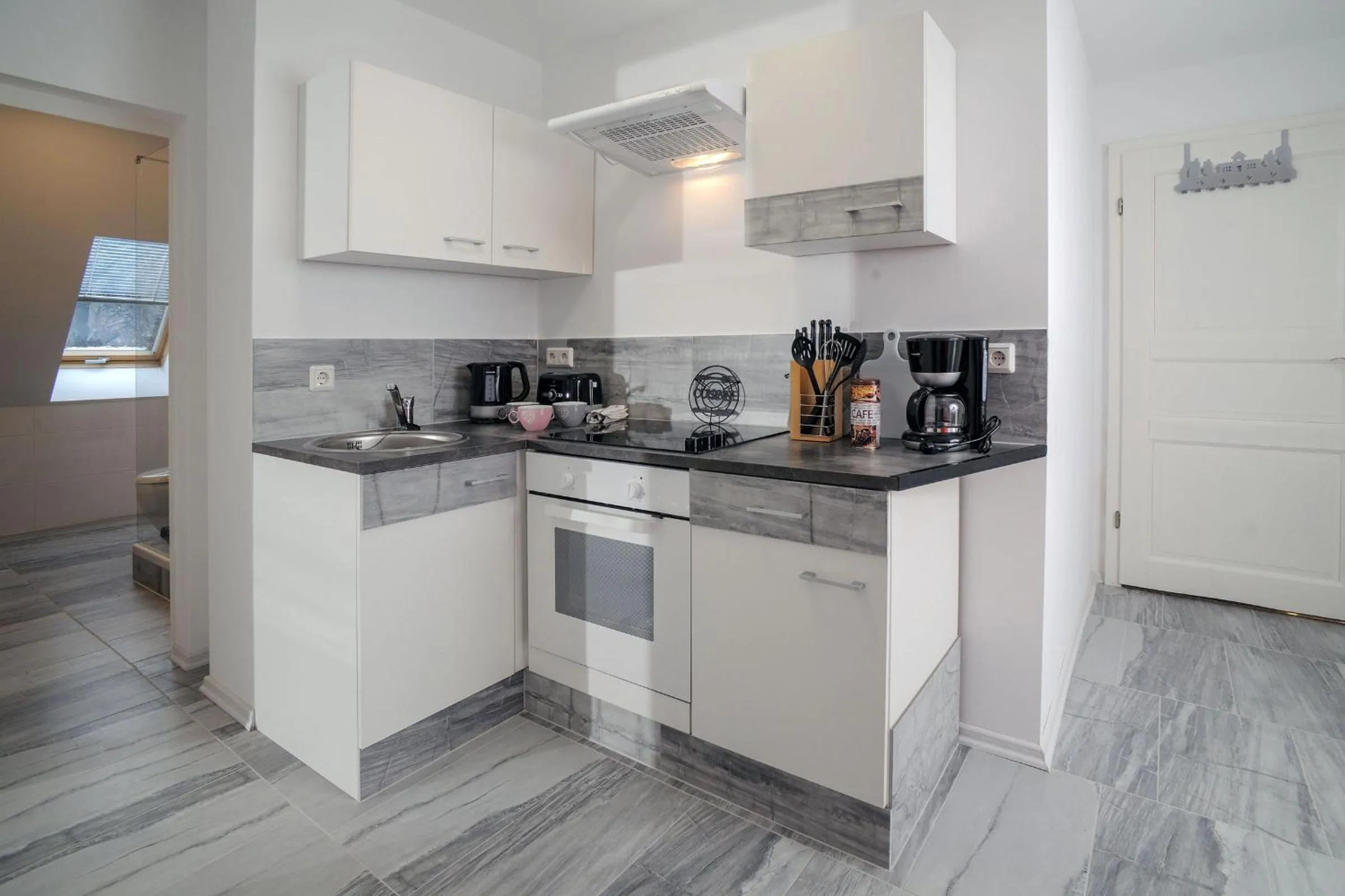 Kitchen or kitchenette in Designpension Traumschloss Hotel Garni