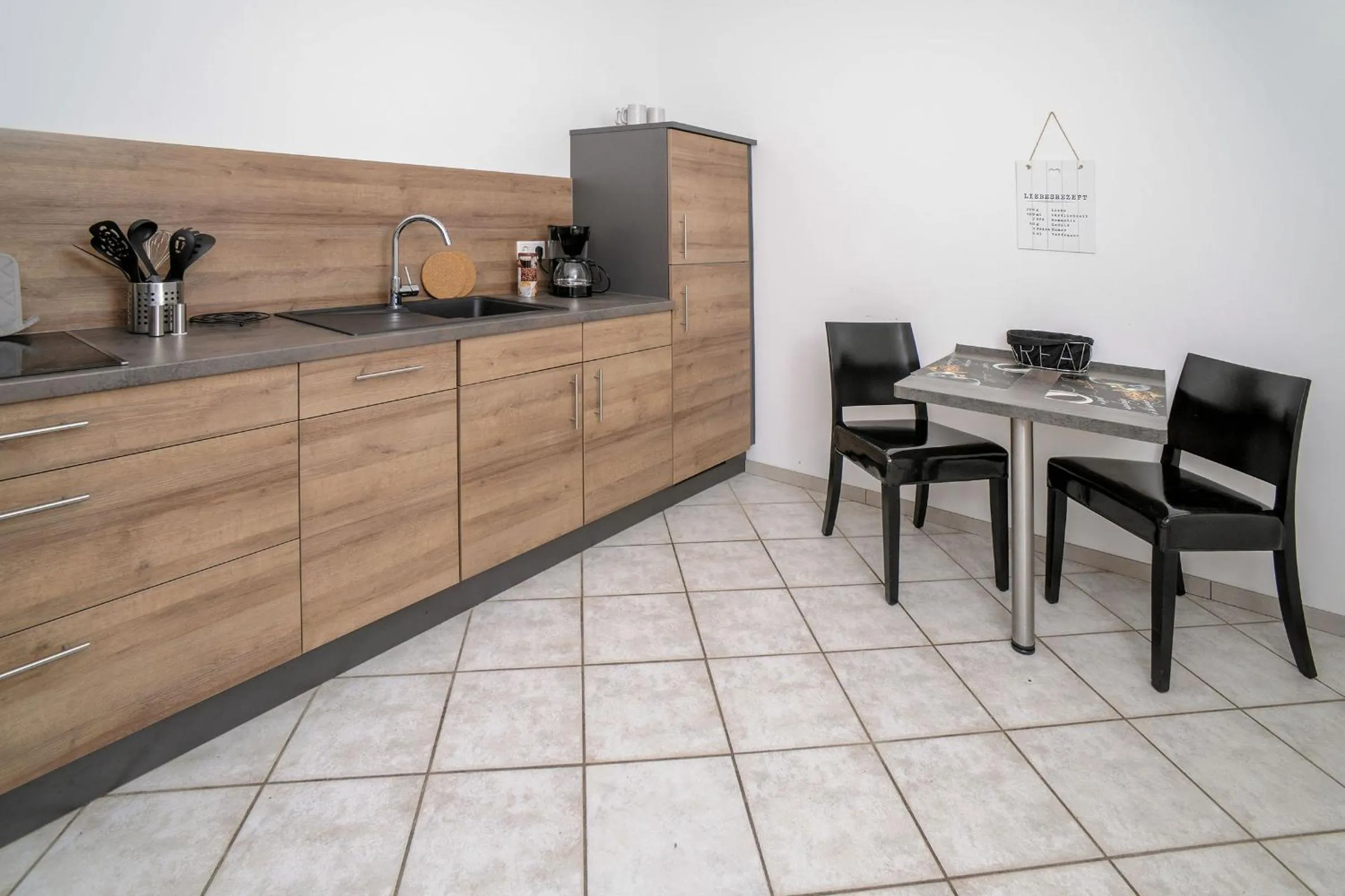 Kitchen or kitchenette in Designpension Traumschloss Hotel Garni