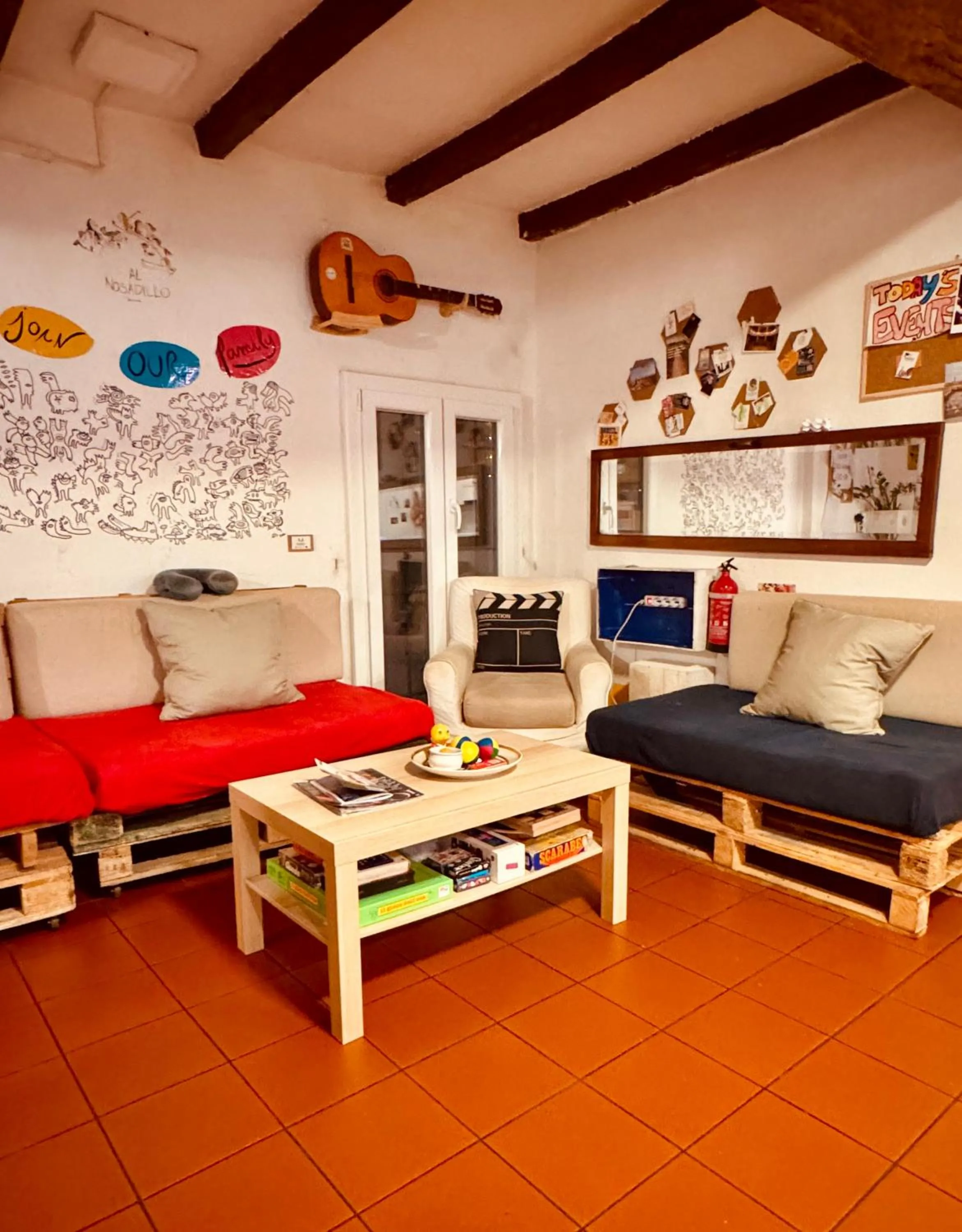 Living room, Bed in Hostel Il Nosadillo - Bologna