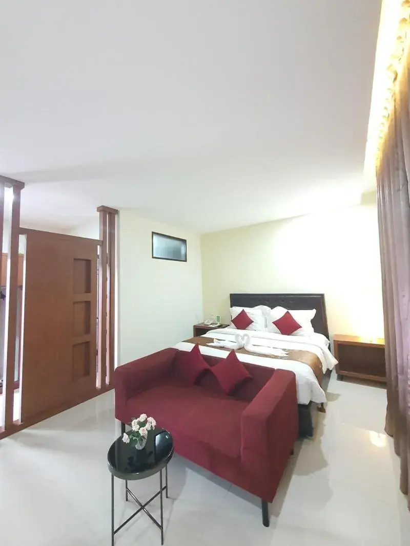 Bed in Grand Mahoni Hotel Bed in Grand Mahoni Hotel