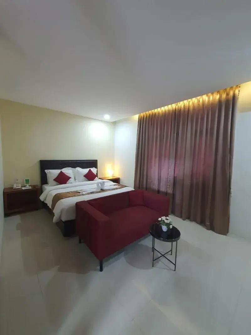 Bed in Grand Mahoni Hotel Bed in Grand Mahoni Hotel