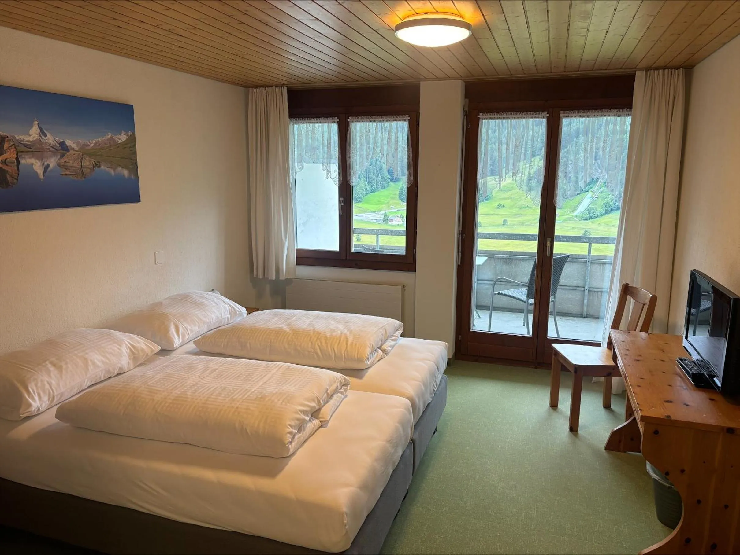 Photo of the whole room, Bed in Hirschen Guesthouse - Village Hotel