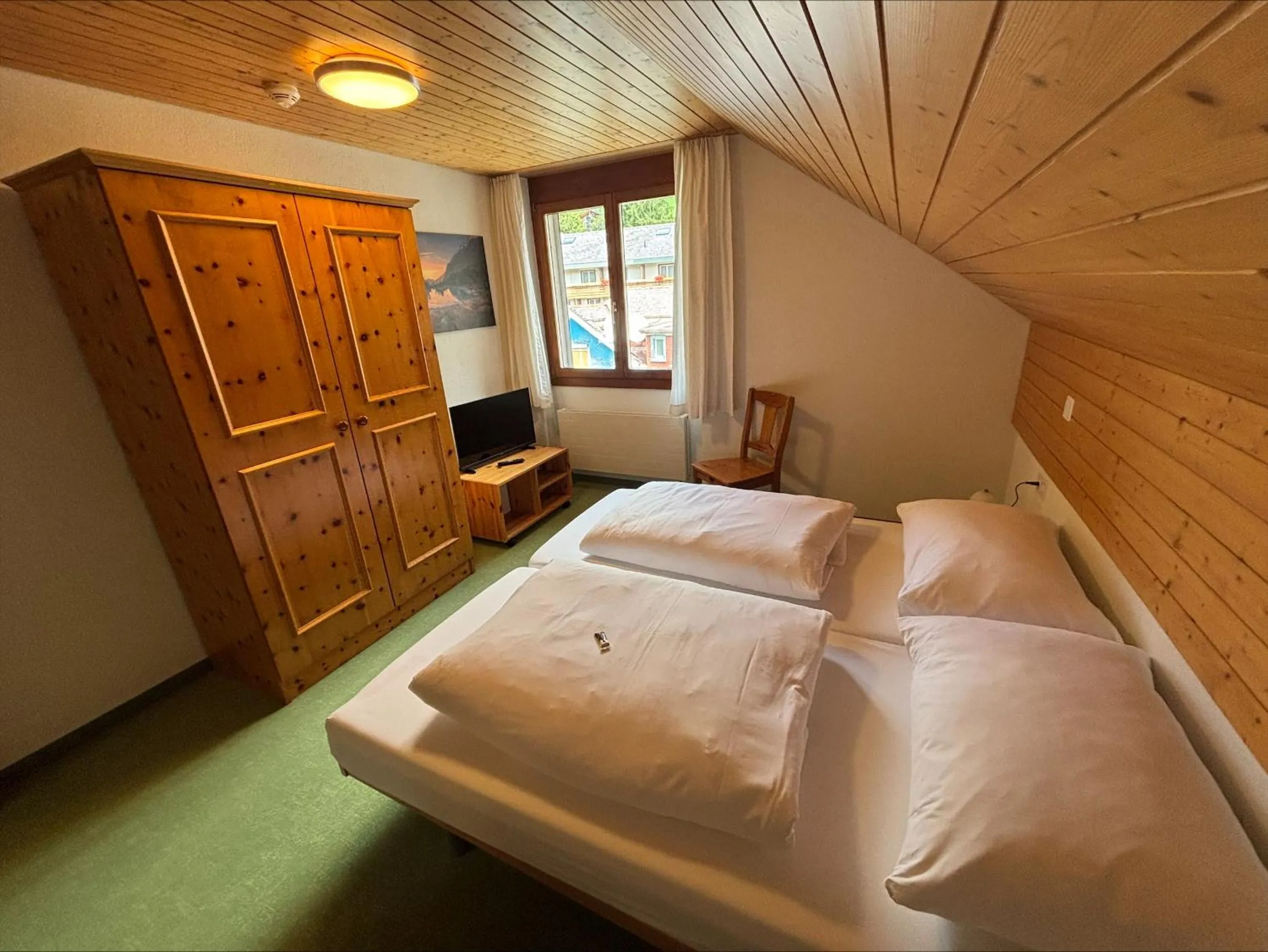 Photo of the whole room, Bed in Hirschen Guesthouse - Village Hotel