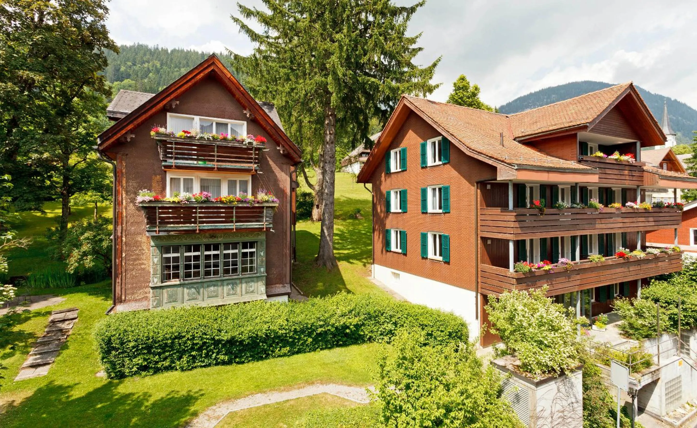 Property building in Hirschen Guesthouse - Village Hotel