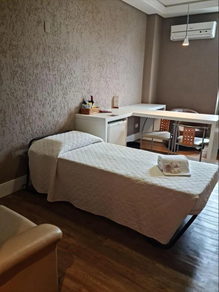 Bed in SJ Royal - San Juan Curitiba