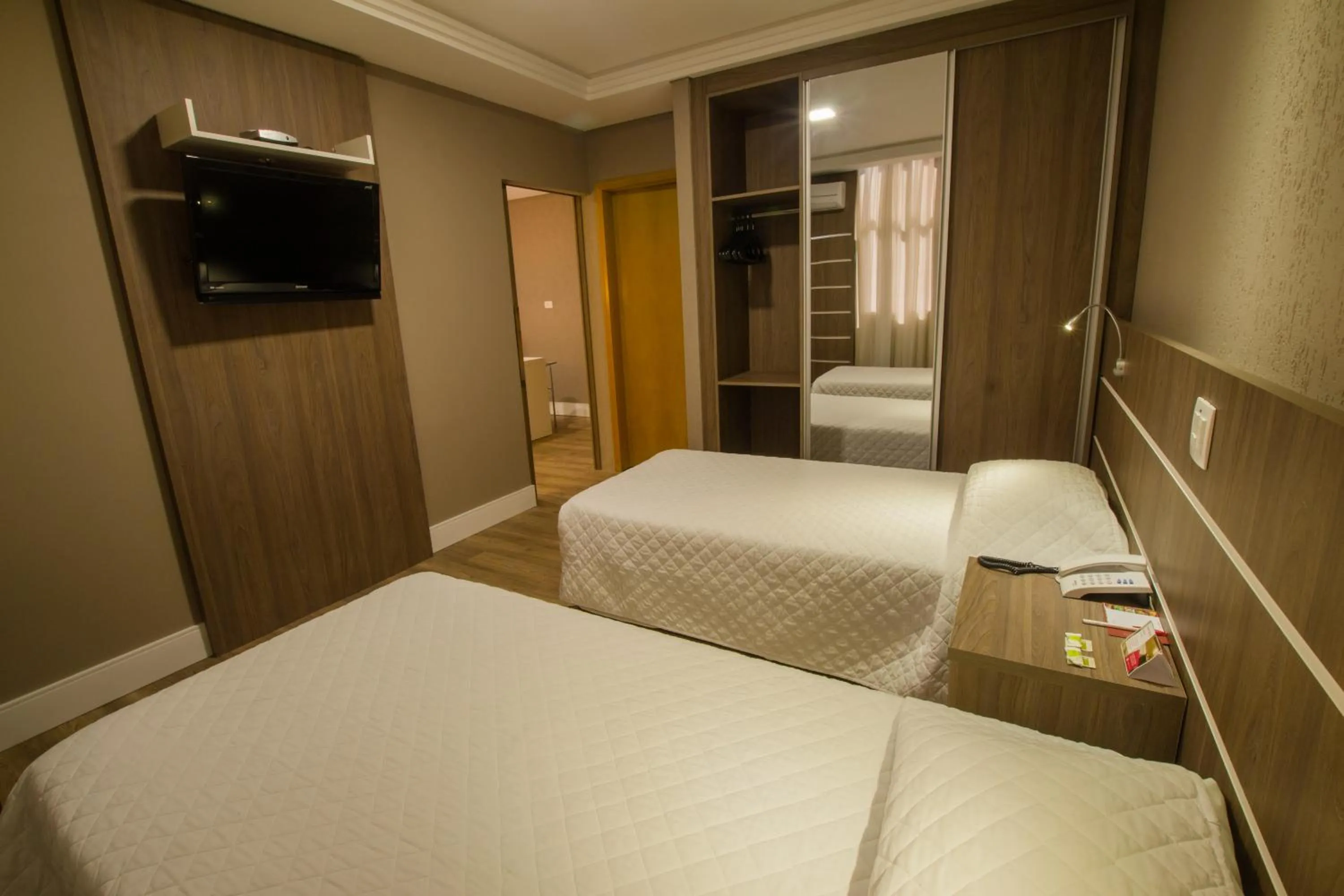 Bed in SJ Royal - San Juan Curitiba