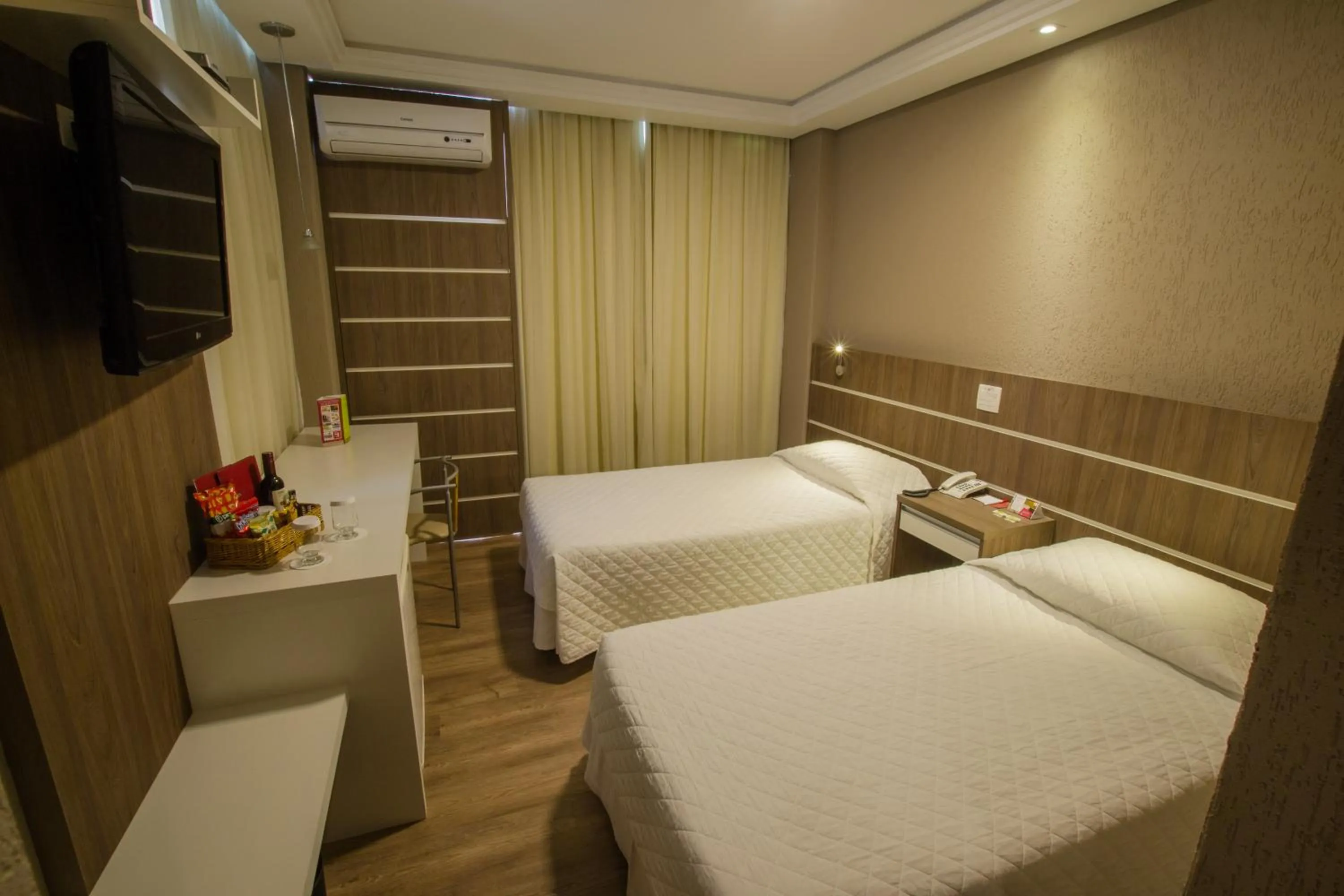 Bed in SJ Royal - San Juan Curitiba