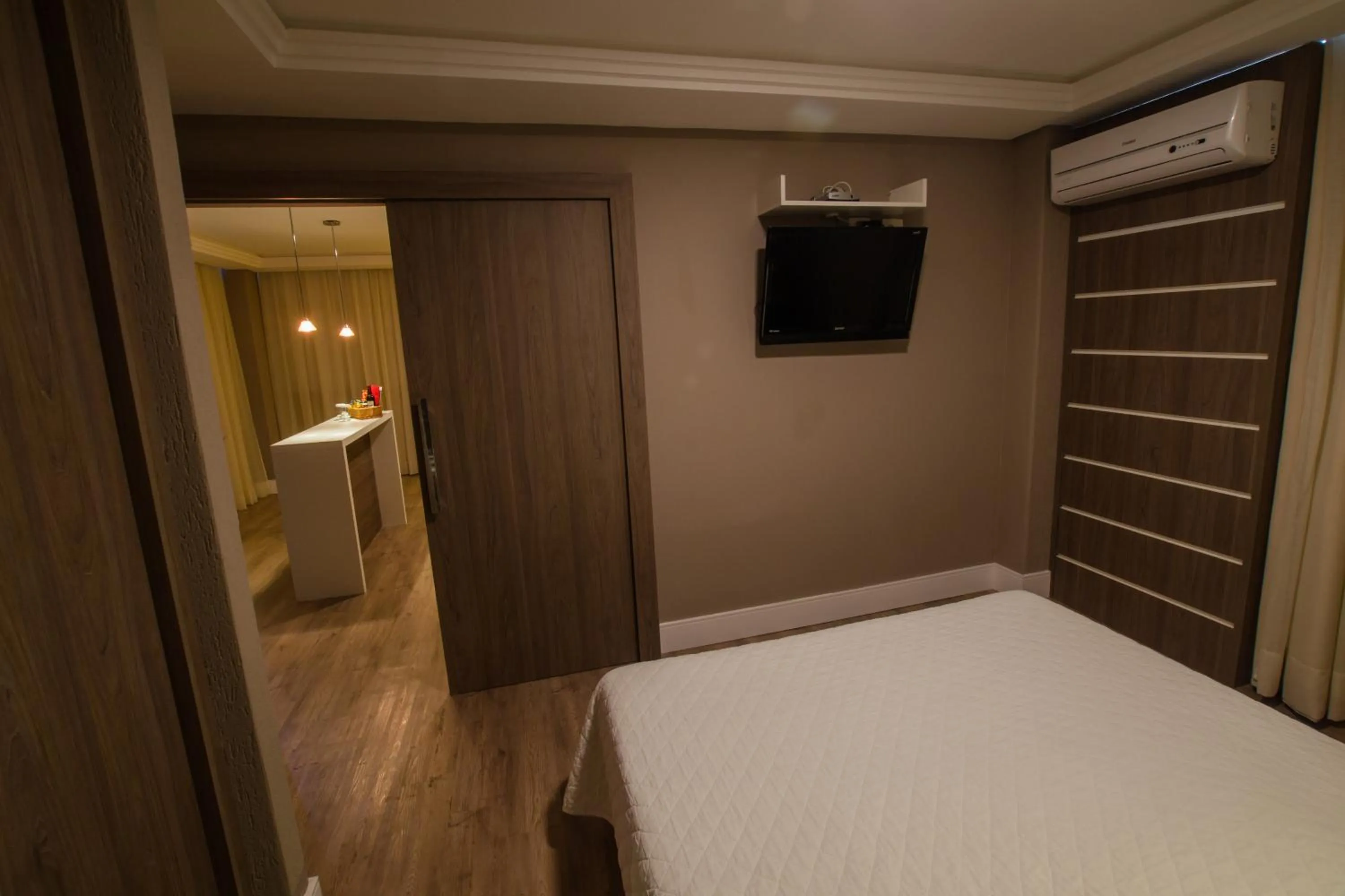 Bed in SJ Royal - San Juan Curitiba