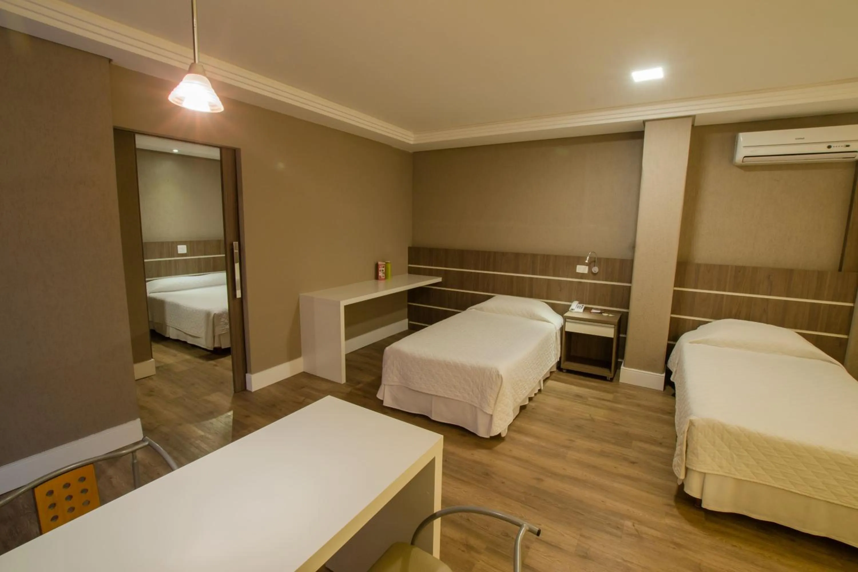 Bed in SJ Royal - San Juan Curitiba