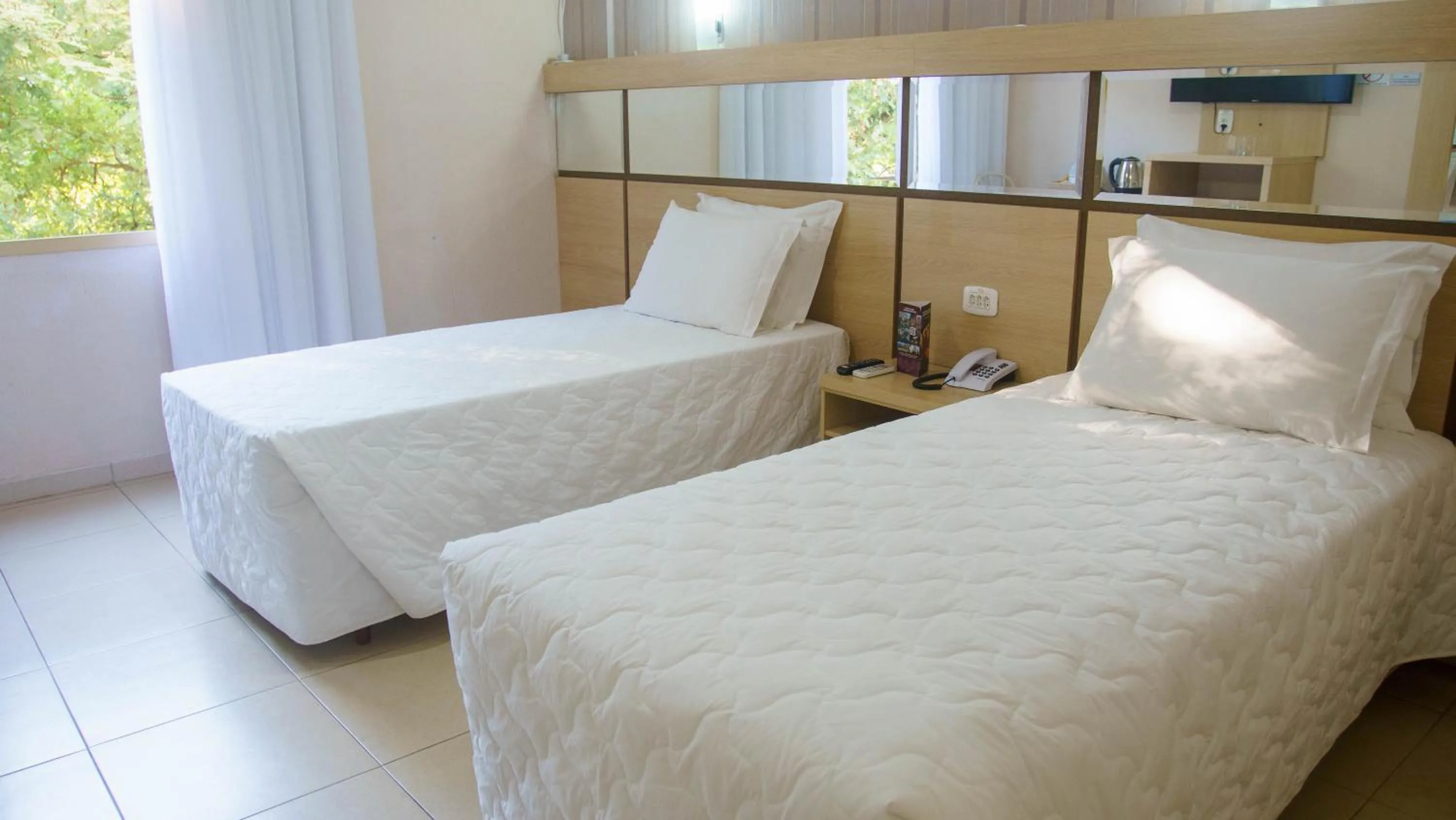 View (from property/room), Bed in SJ Tour - San Juan Foz do Iguaçu