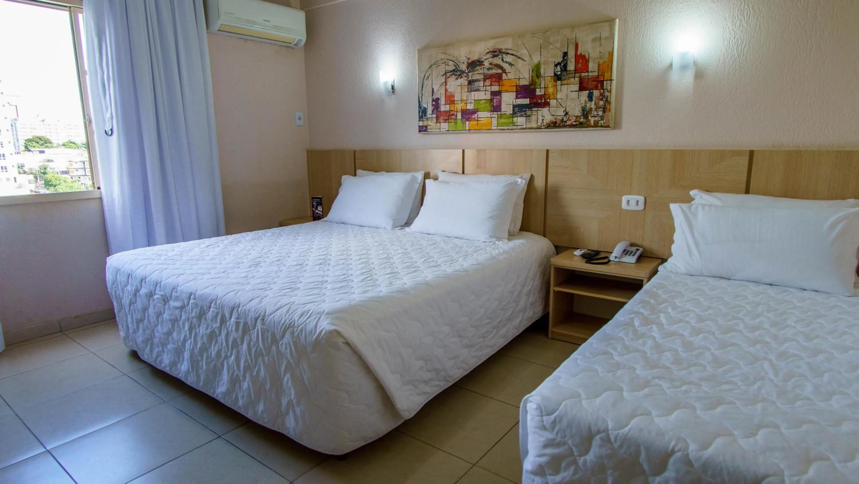 Photo of the whole room, Bed in SJ Tour - San Juan Foz do Iguaçu