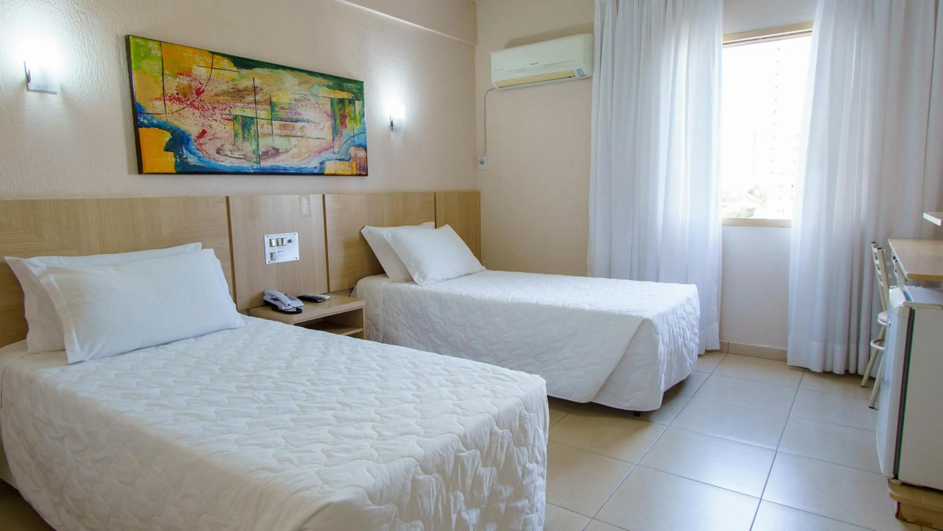 Photo of the whole room, Bed in SJ Tour - San Juan Foz do Iguaçu