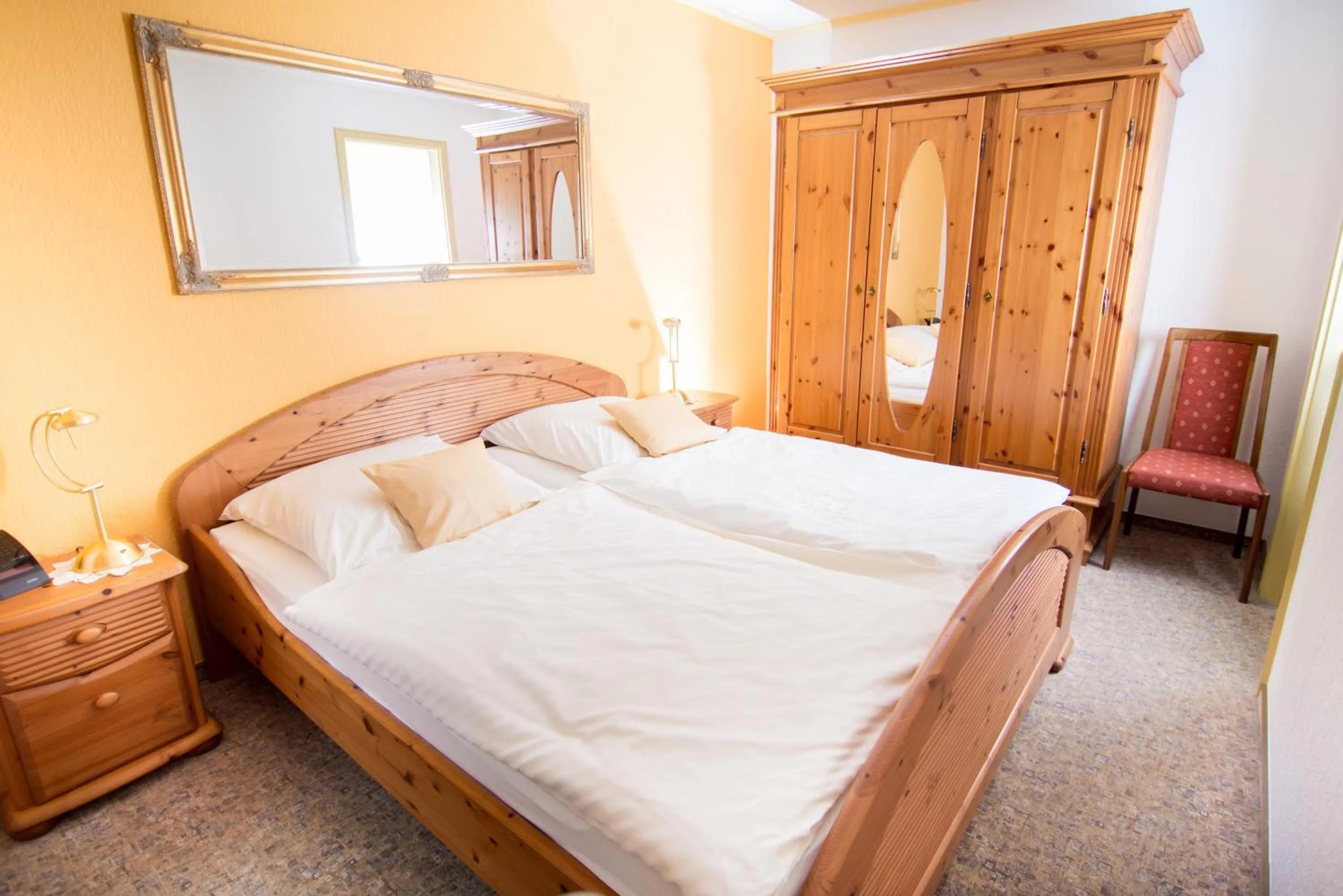 Bed in Ferienapartments Schnibbe