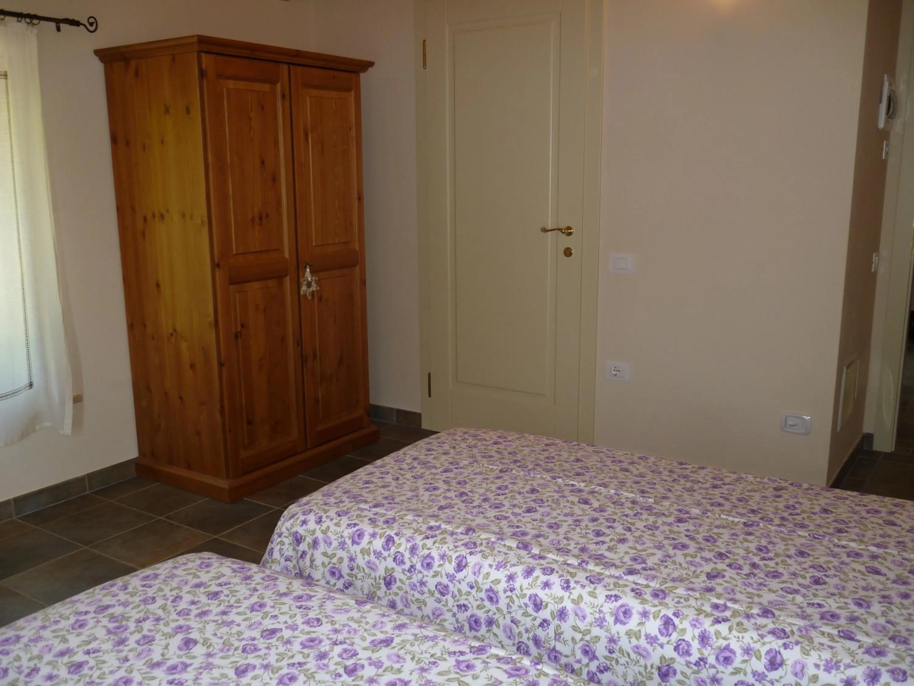 Decorative detail, Bed in Agriturismo Corte Carolina