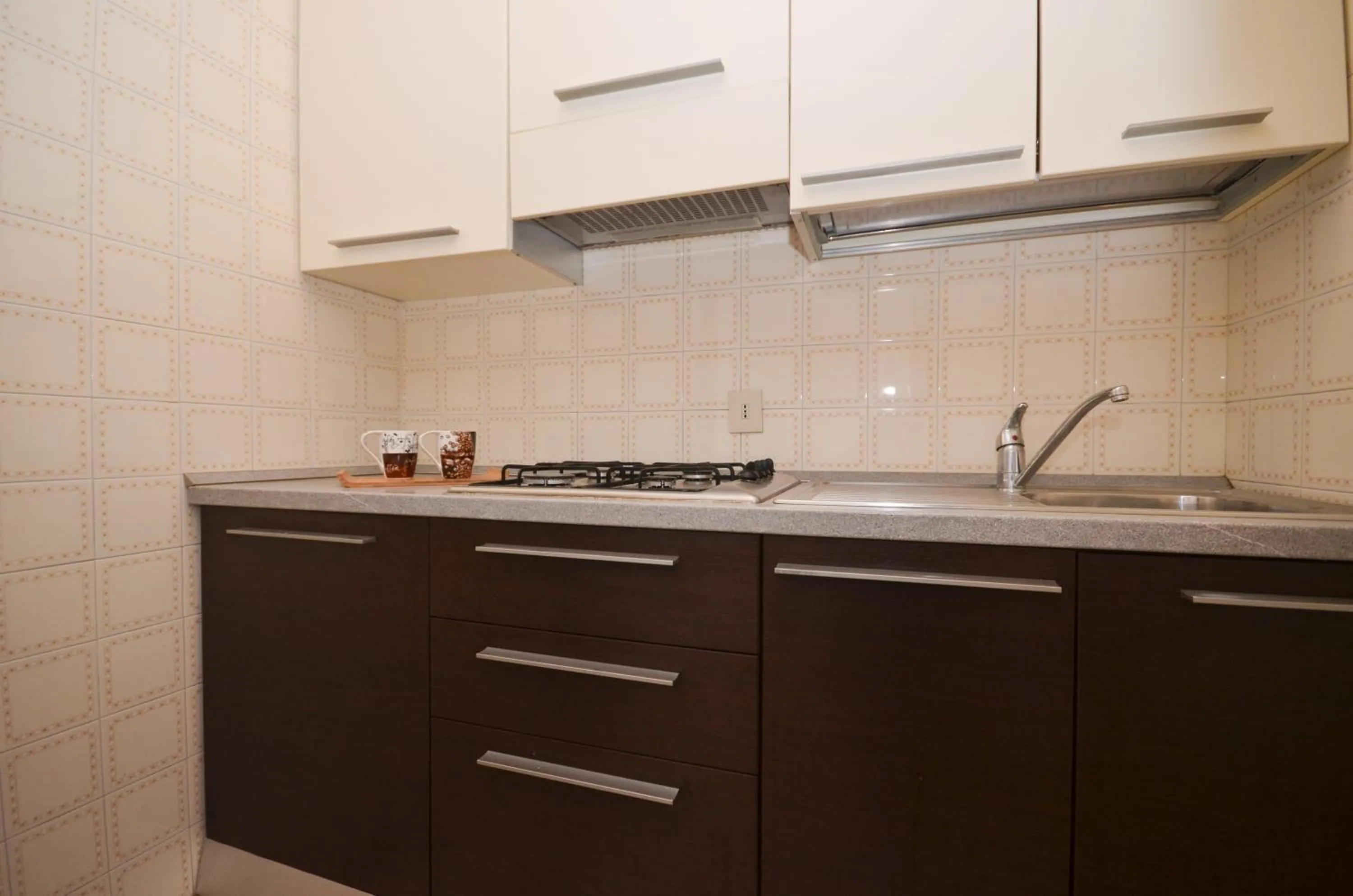 Kitchen or kitchenette in Appartamenti Carina