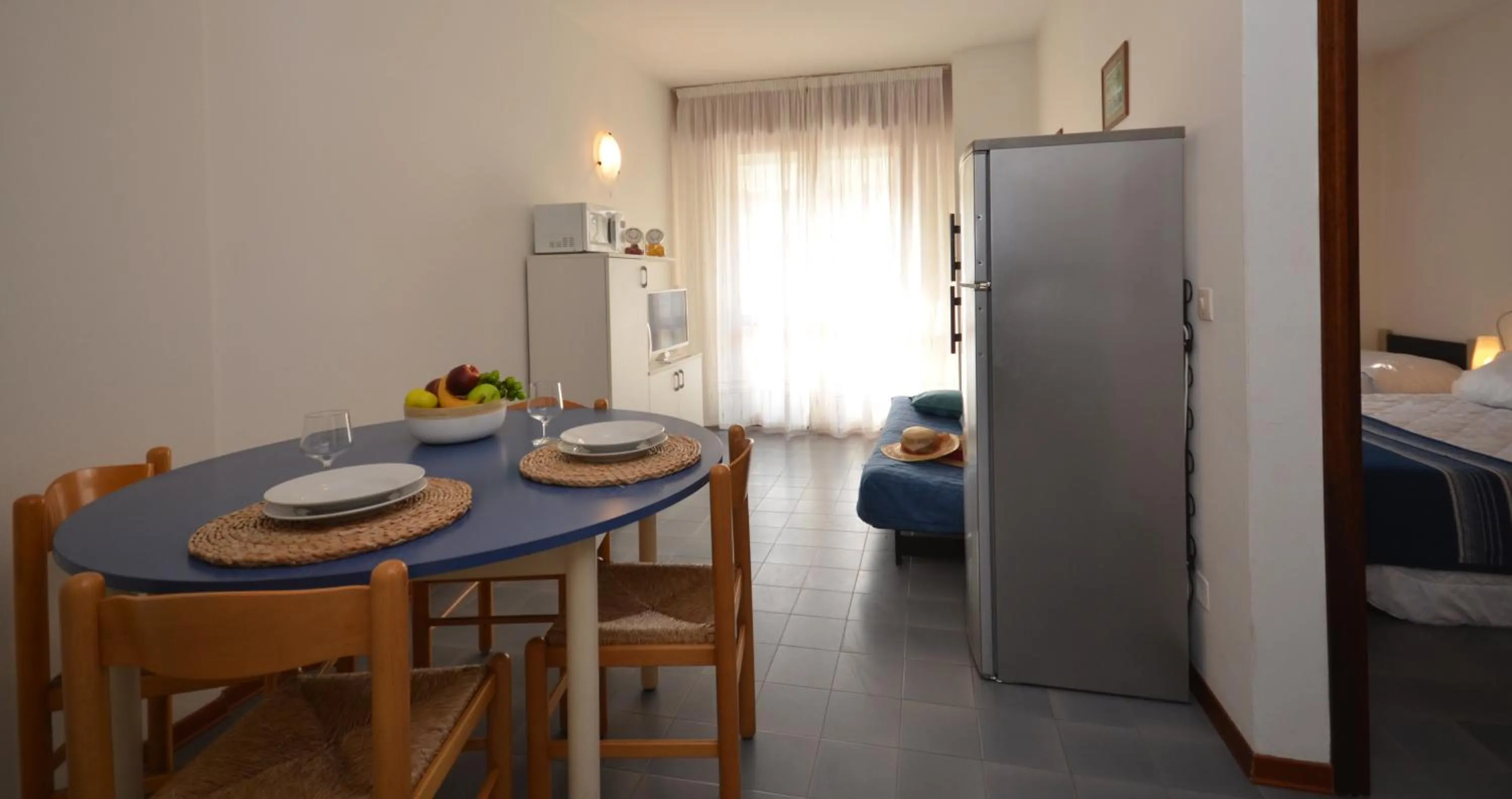 Kitchen or kitchenette, Bed in Appartamenti Marina Grande