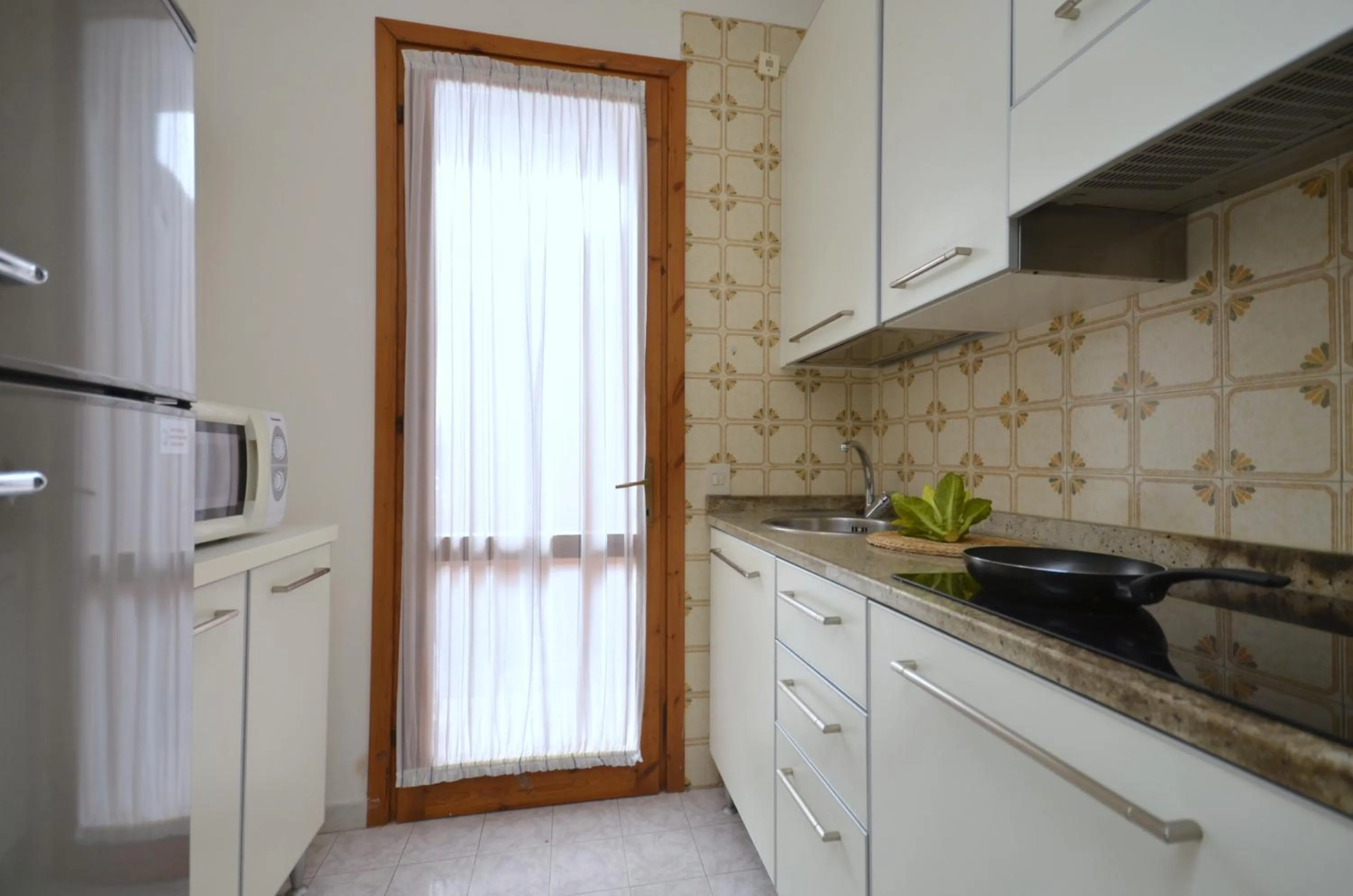 Kitchen or kitchenette in Villaggio Capistrano