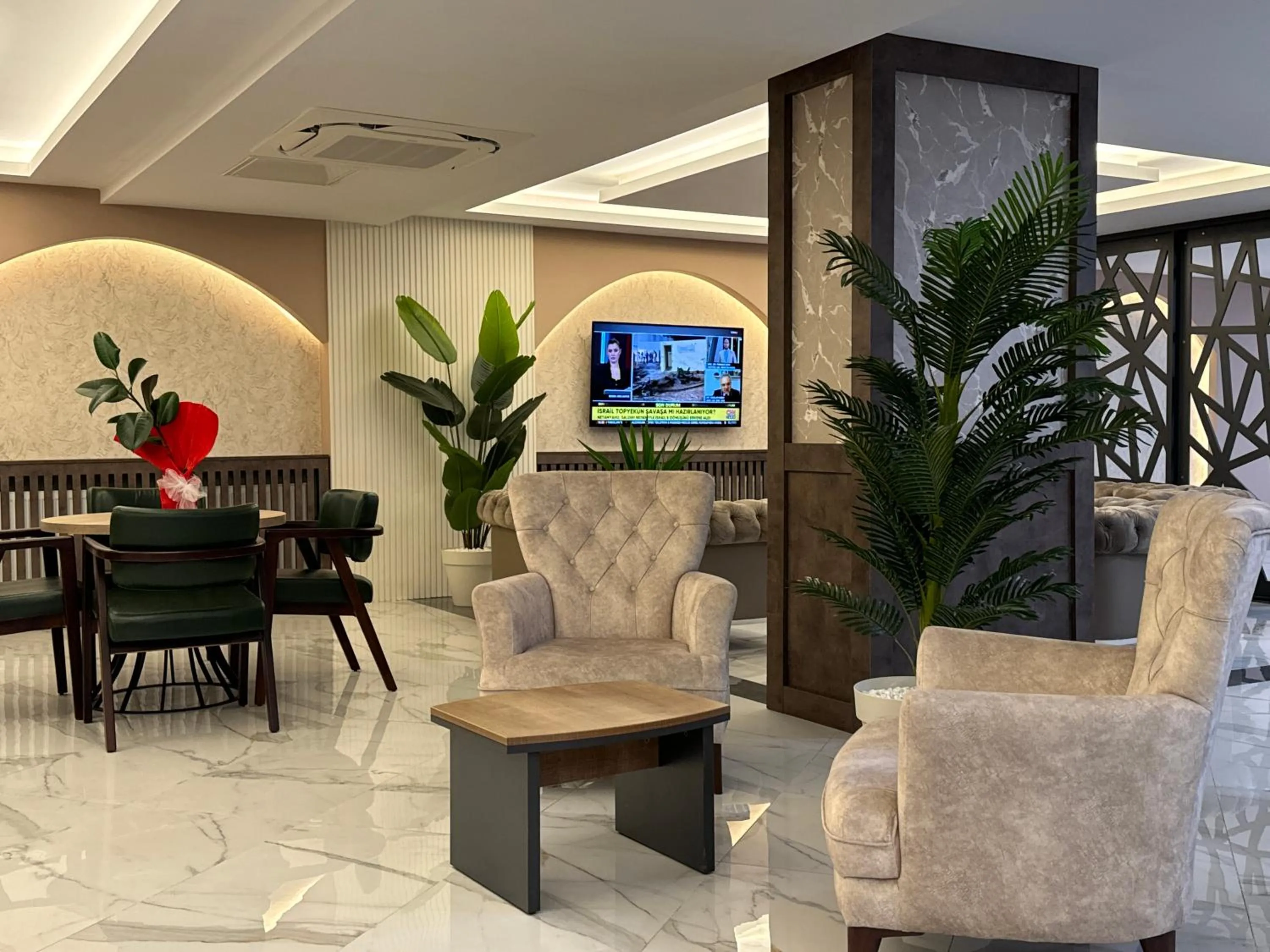 Communal lounge/ TV room in KORKMAZ OTEL