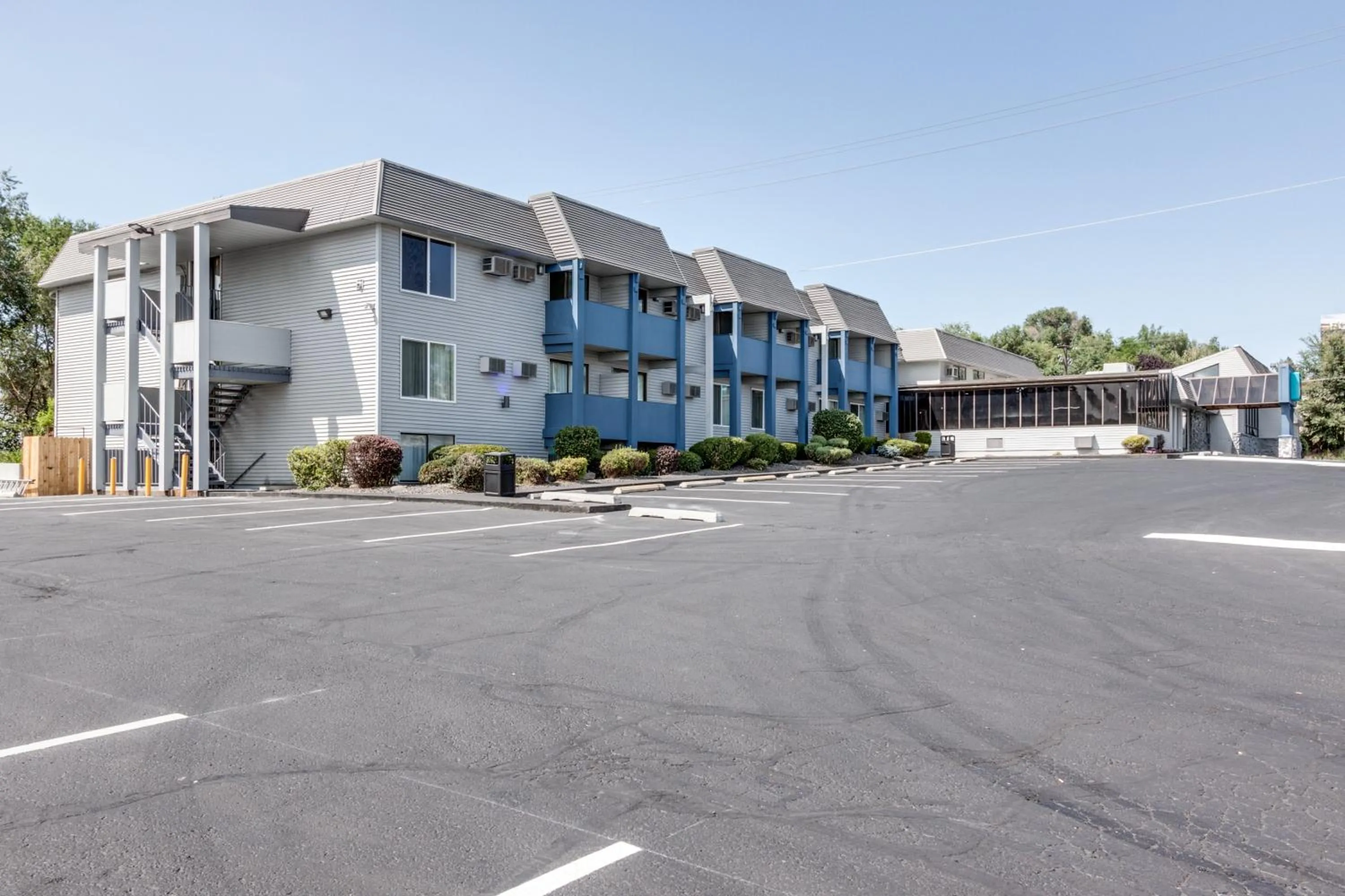 Property building in Days Inn & Suites by Wyndham Spokane