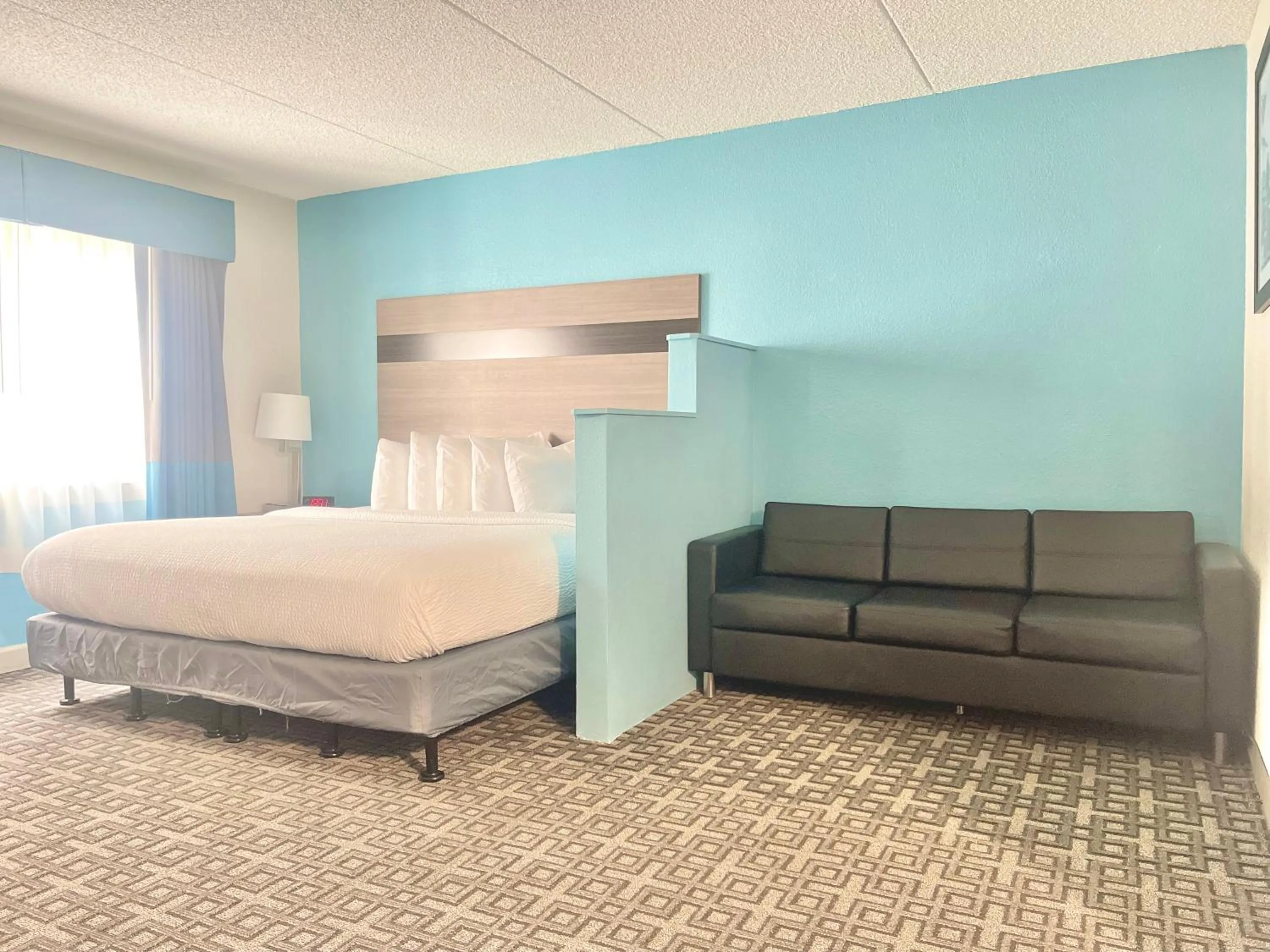 Bed in Days Inn & Suites by Wyndham Spokane
