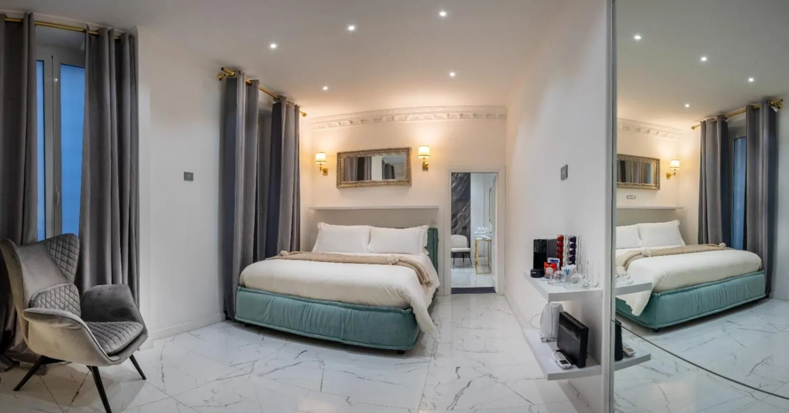 Bed in Daphne Suites