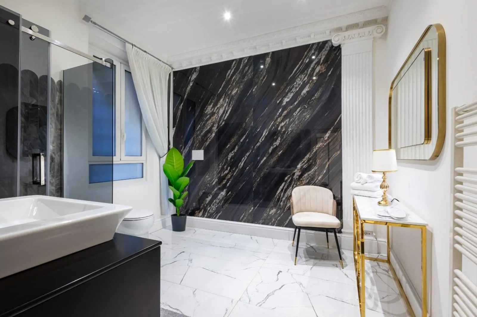 Bed in Daphne Suites