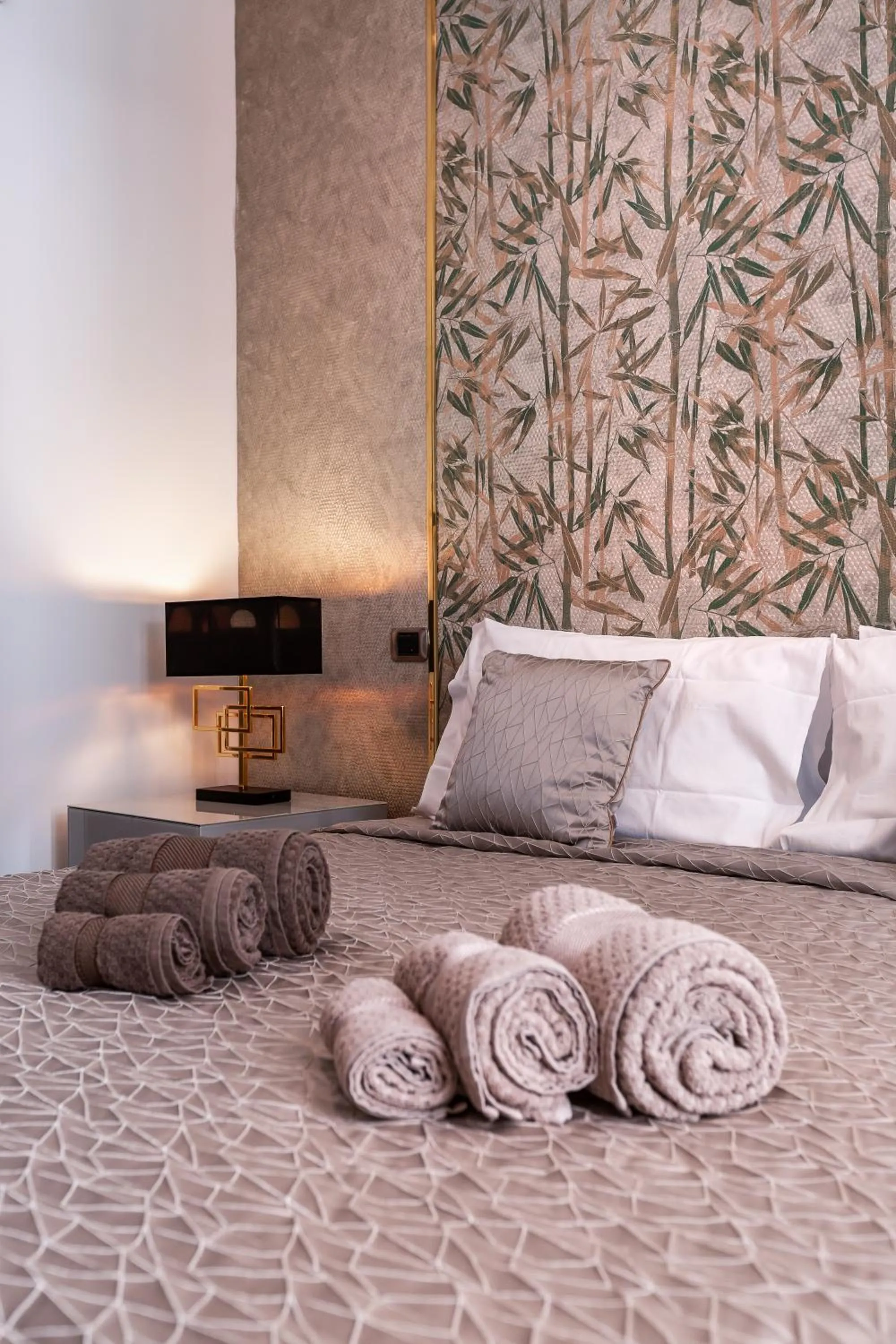 Bed in Daphne Suites