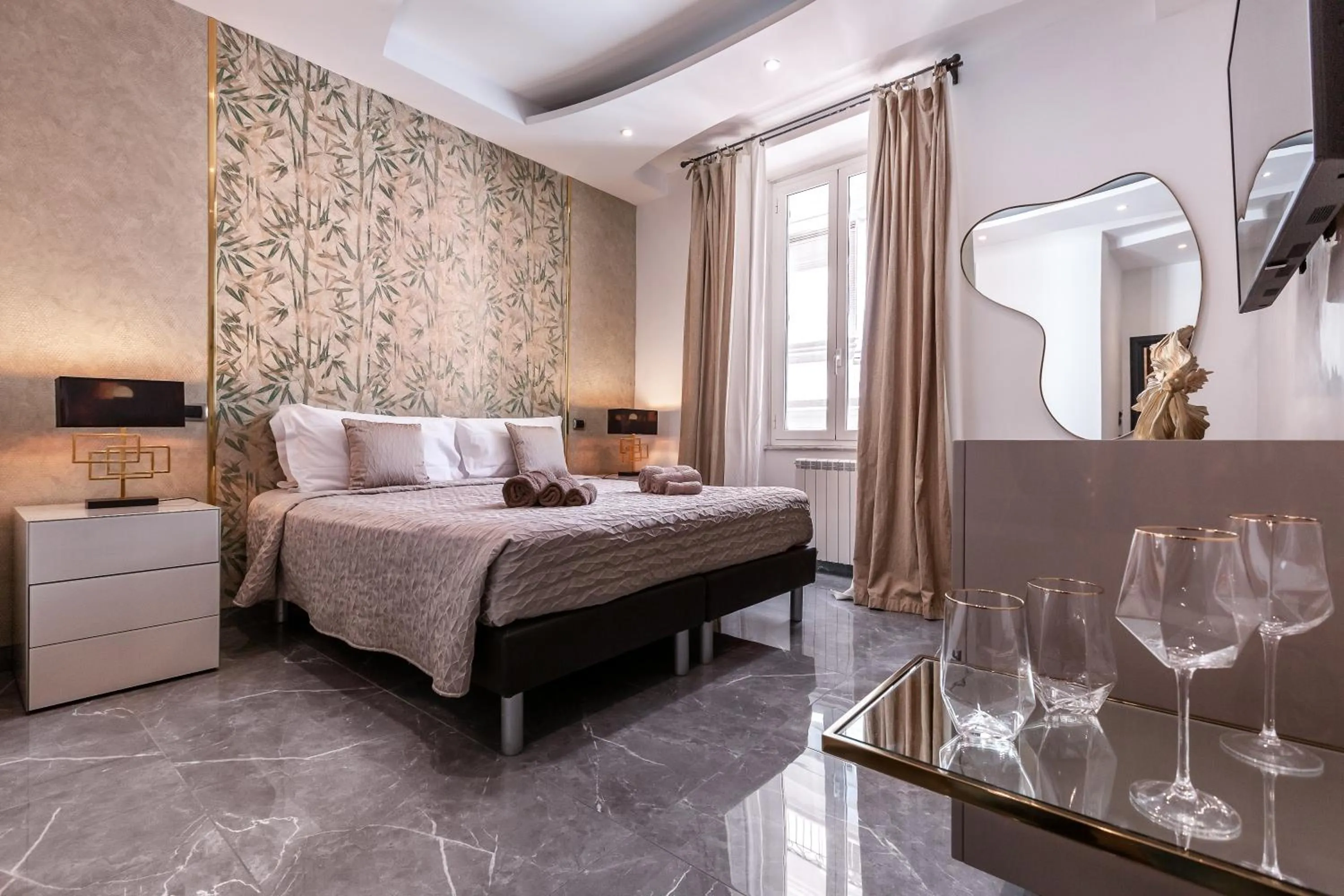 Bed in Daphne Suites