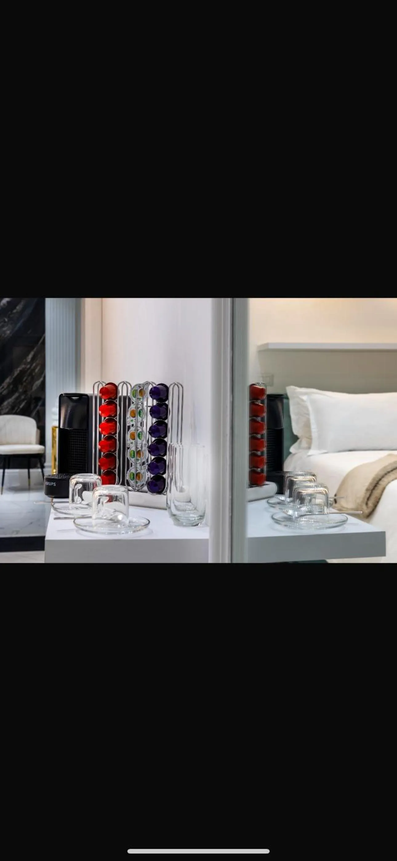 Bed in Daphne Suites