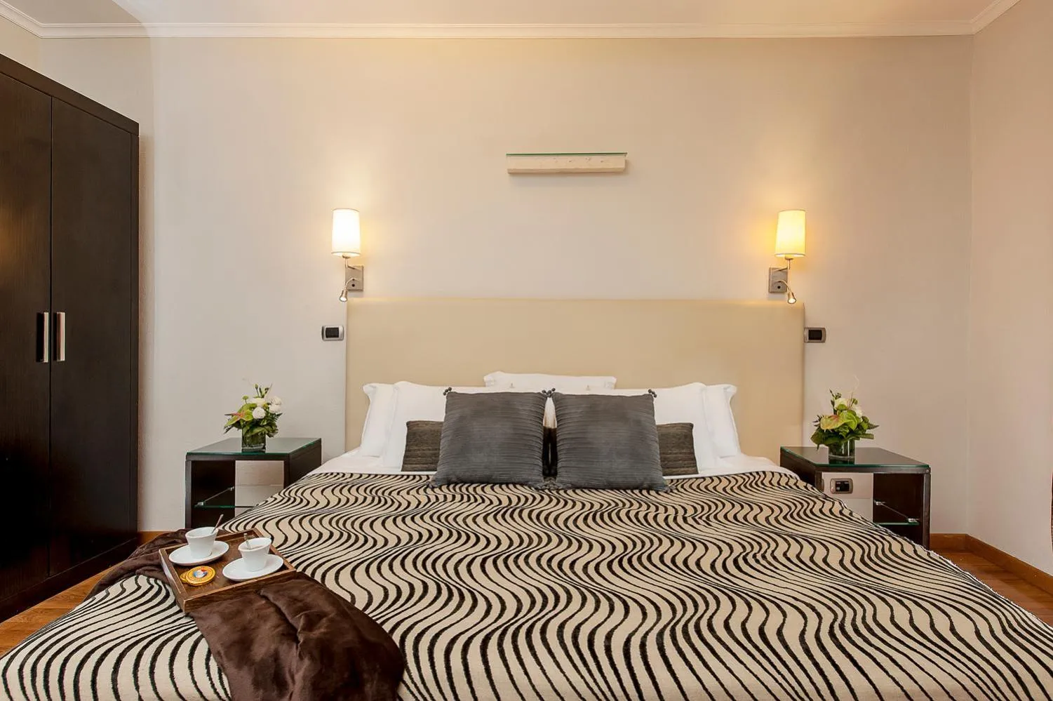 Bed in Daphne Suites