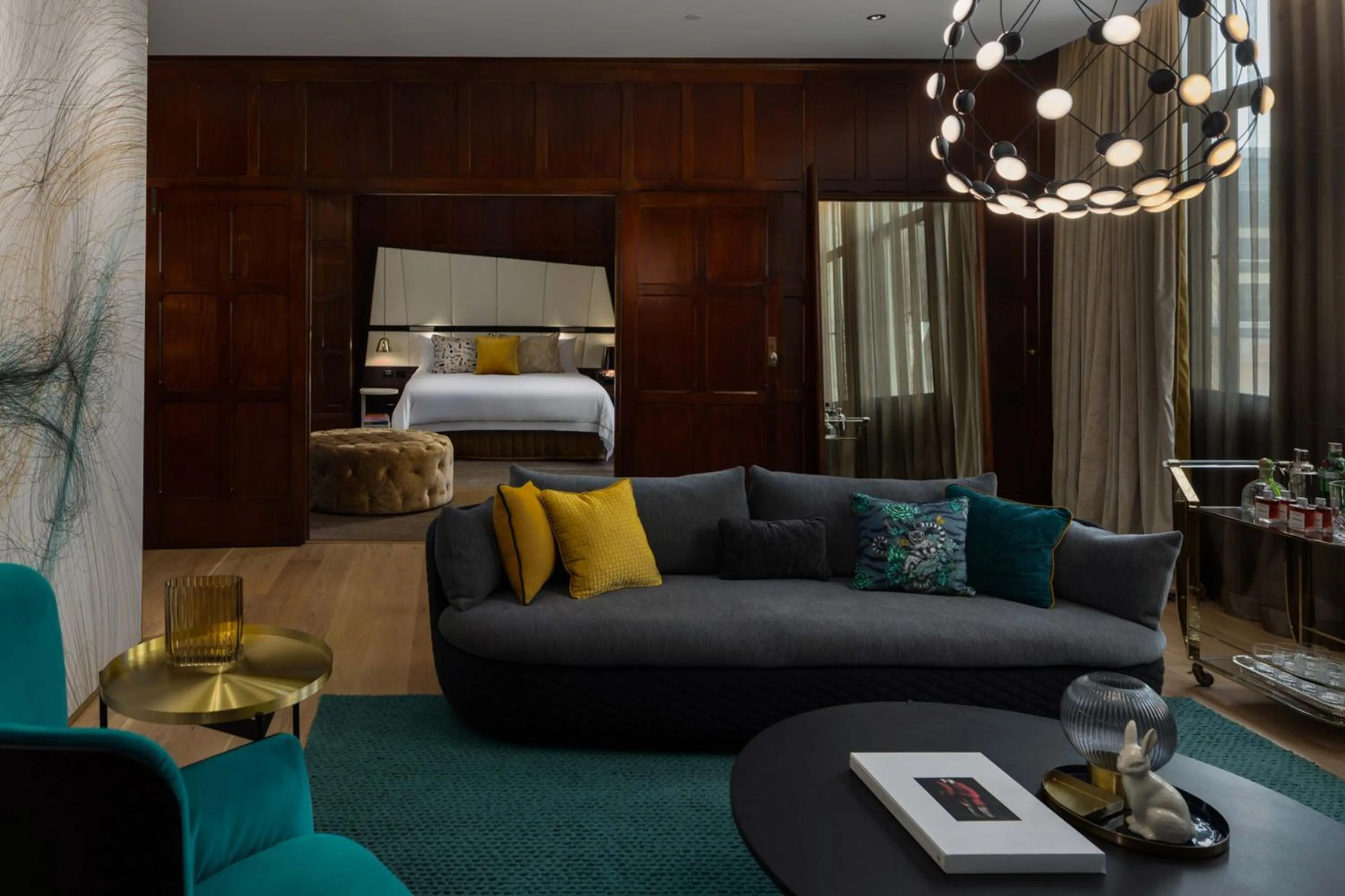 Living room, Bed in QT Sydney