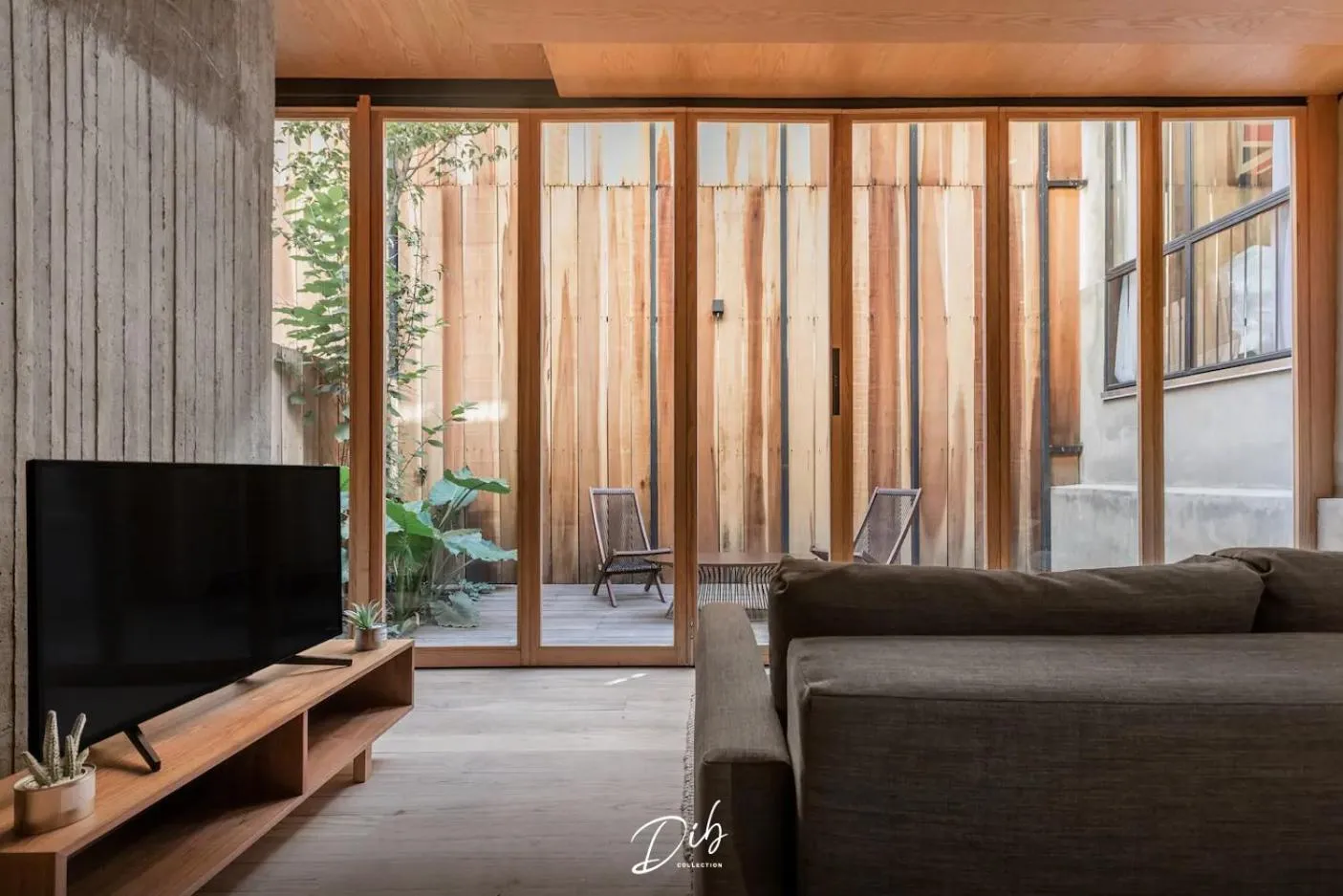 Communal lounge/ TV room in DIB Collection - Modern Stays in Roma Norte