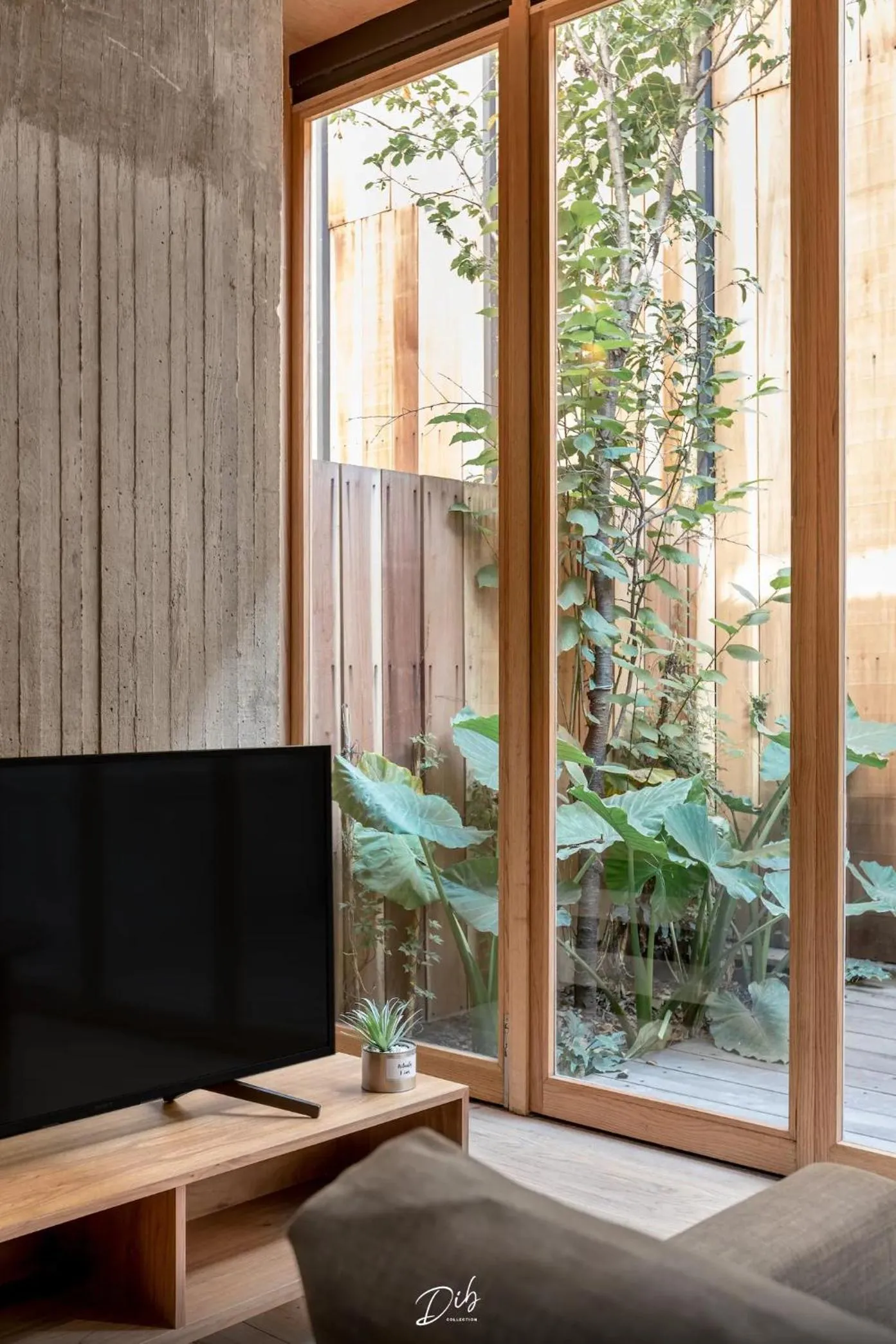 Communal lounge/ TV room in DIB Collection - Modern Stays in Roma Norte