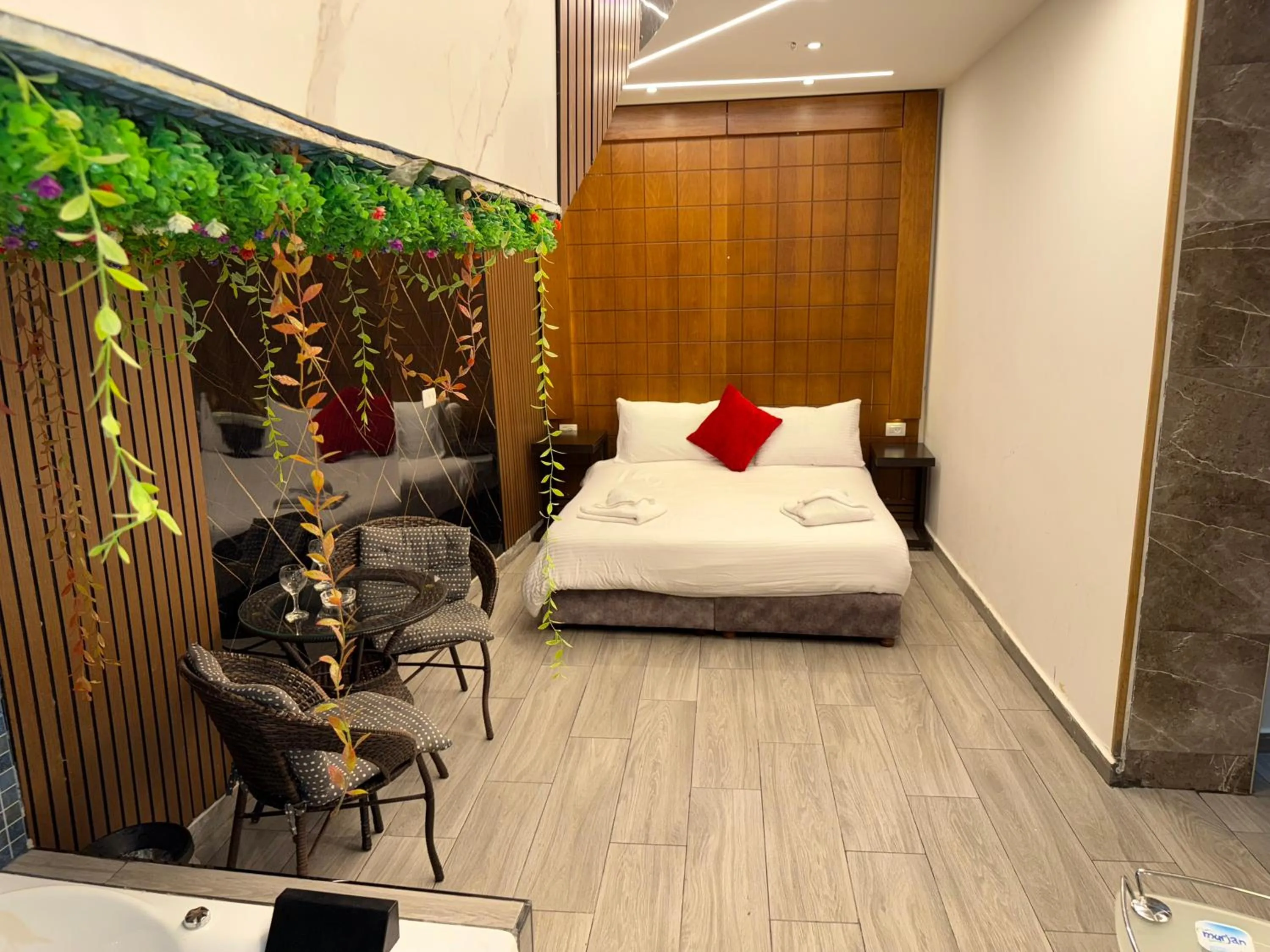 Bed in Assaraya Palace Hotel