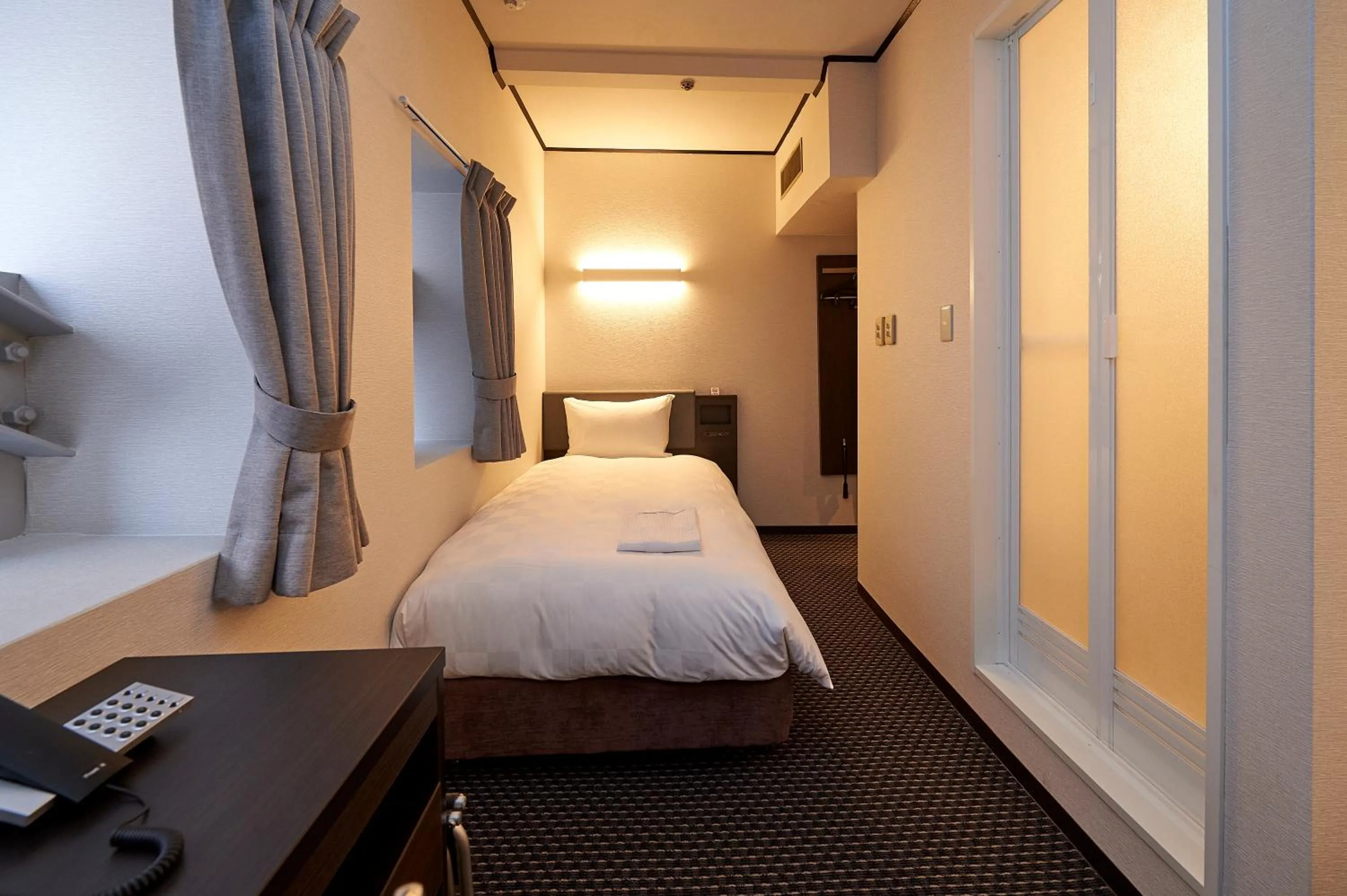 Photo of the whole room, Bed in Hotel Consort Shin-Osaka