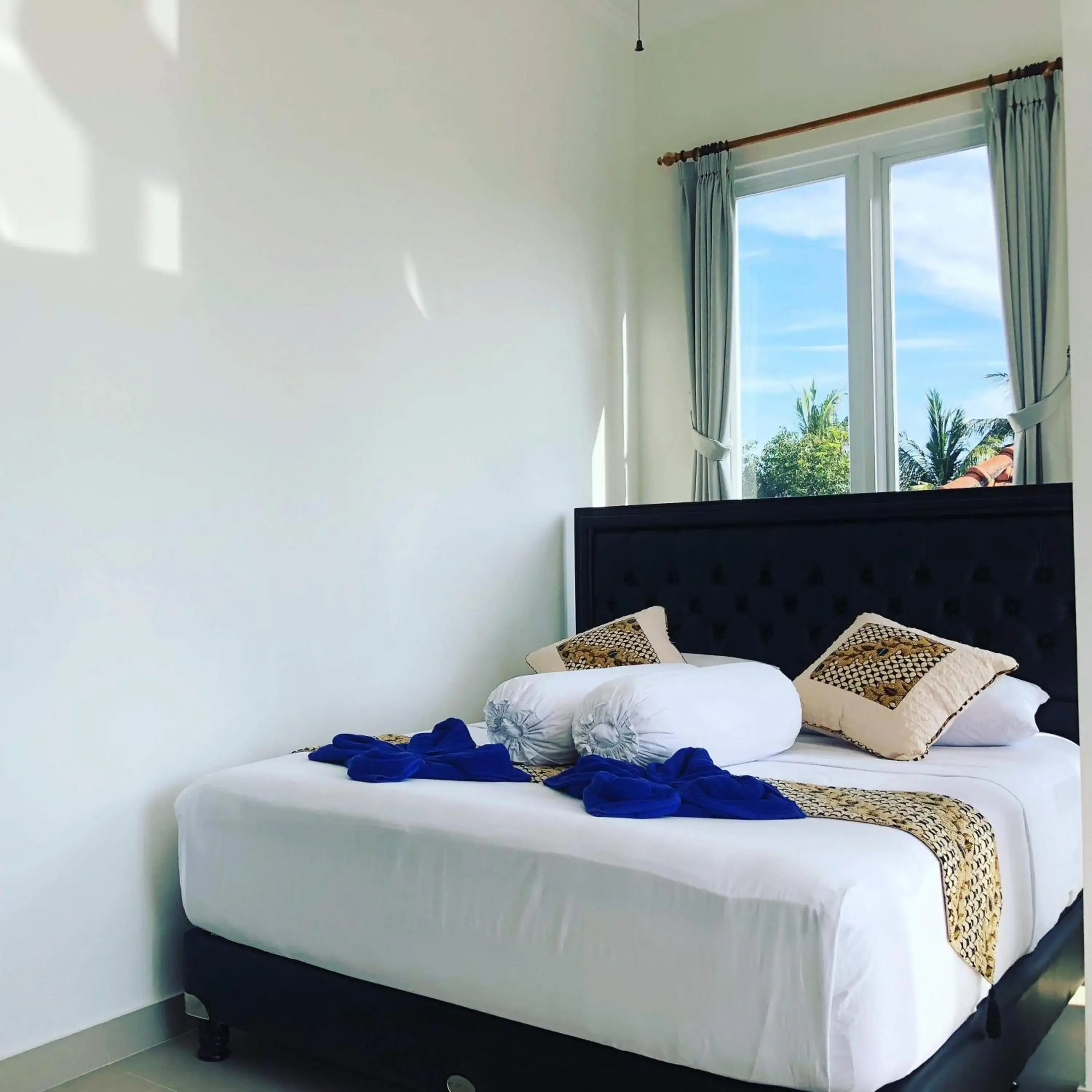 Queen Room with Two Queen Beds in Vila Troja Kubu Queen Room with Two Queen Beds in Vila Troja Kubu