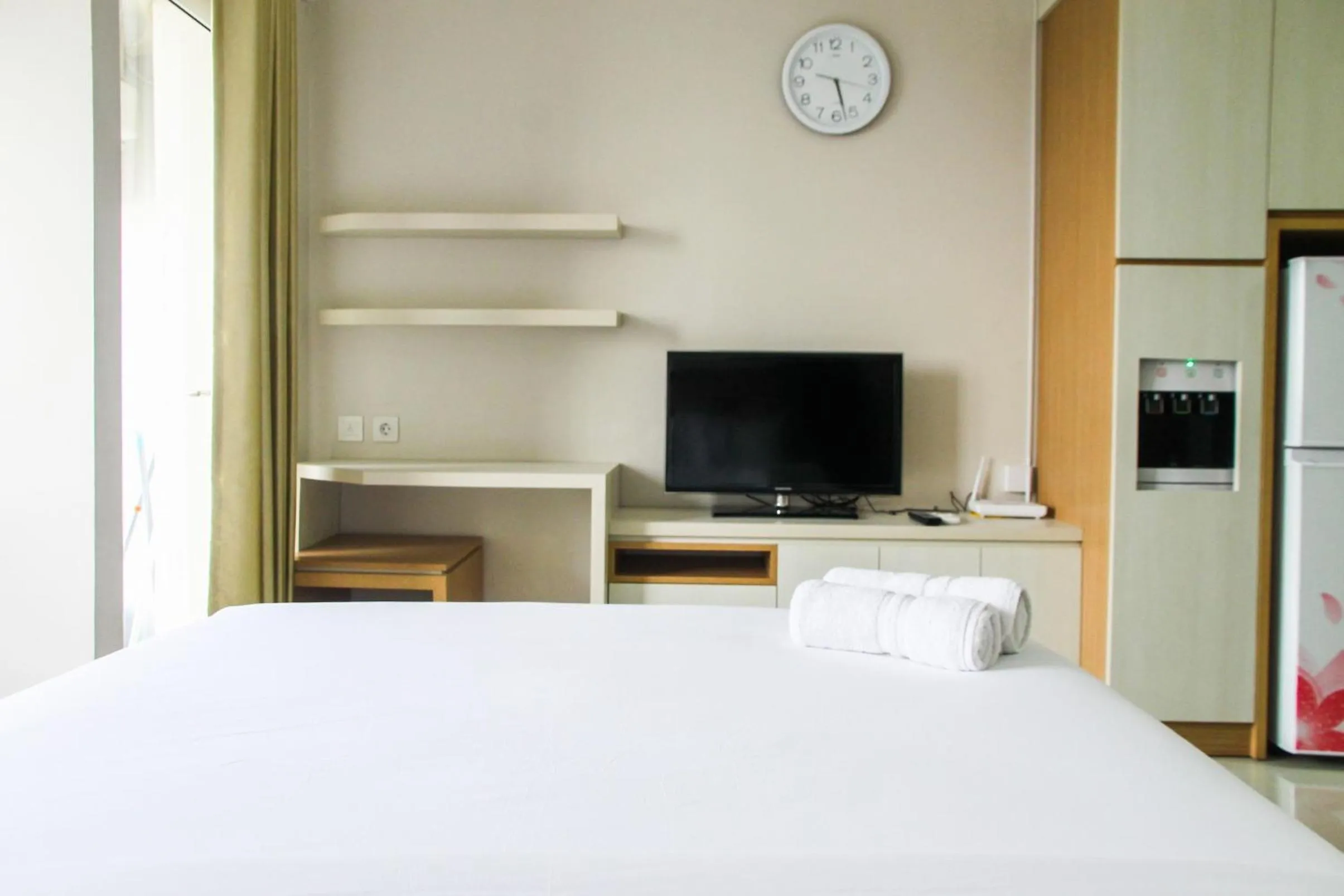 Bed in Best and Homey 2BR Taman Sari Semanggi Apartment By Travelio