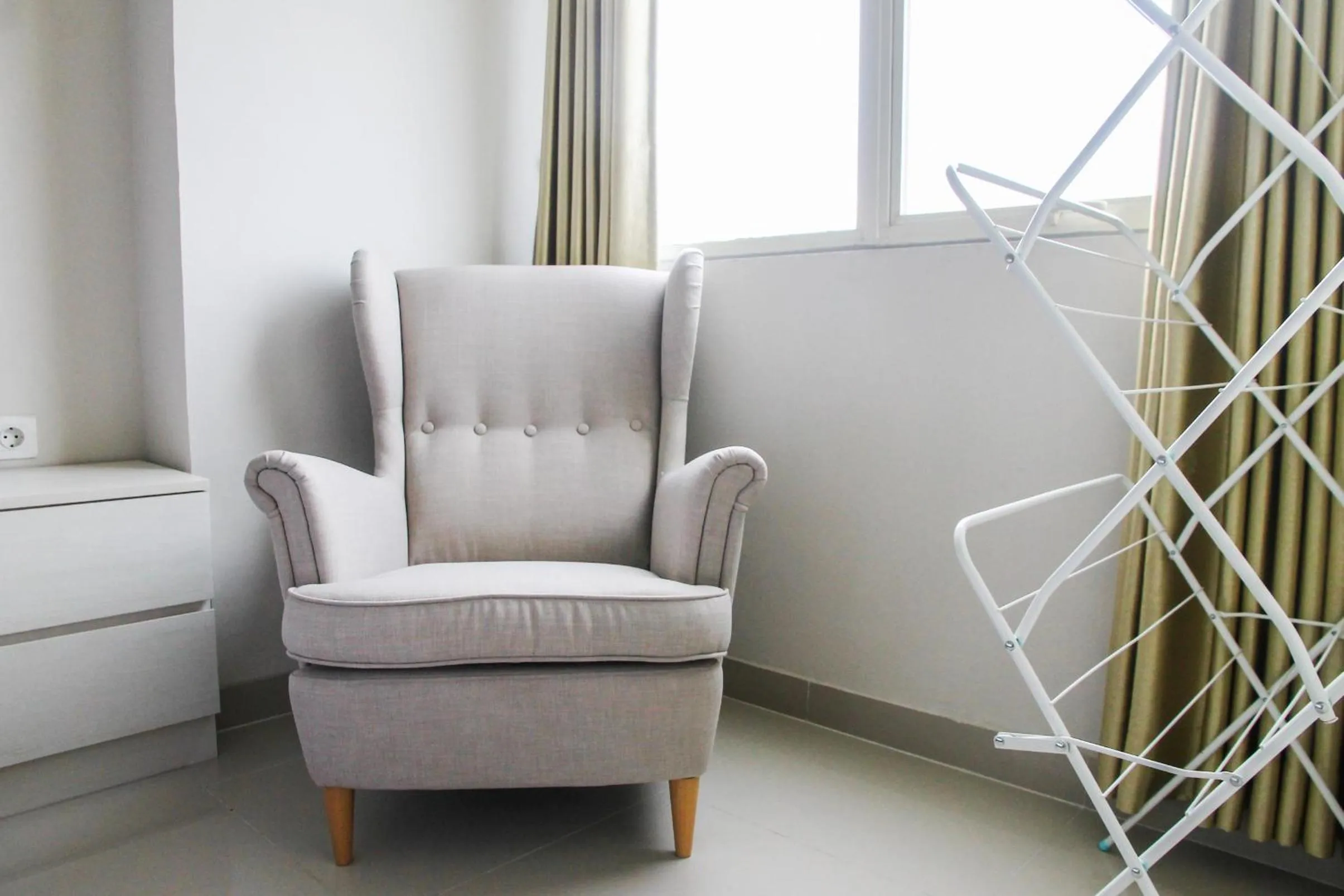 Seating area in Best and Homey 2BR Taman Sari Semanggi Apartment By Travelio